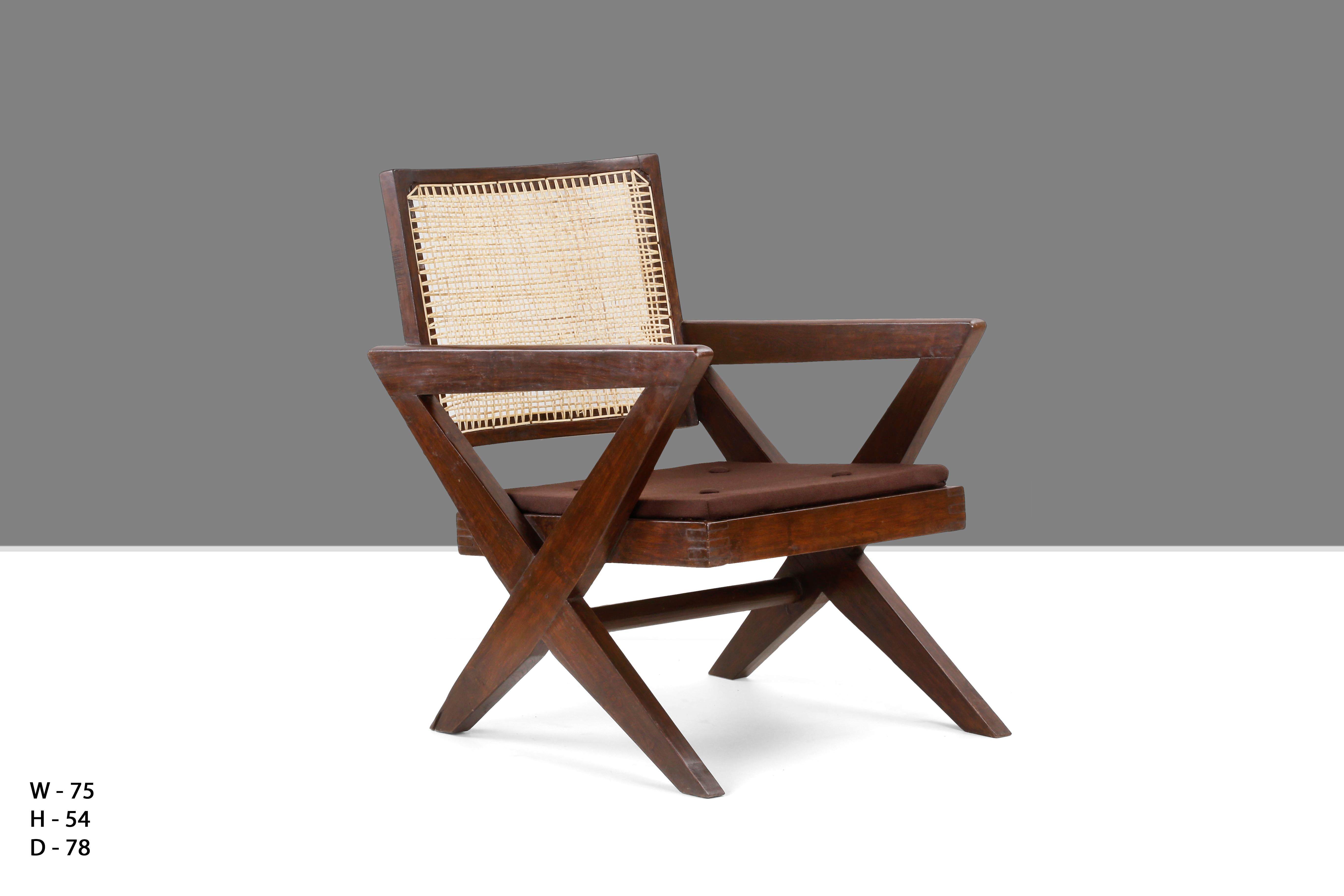 Rare armchair known as “Cross easy chair” in solid teak and braided canework, circa 1955-1956. We have two of them to offer. PJ-SI-45-A for Chandigarh. 

This chair is a fantastic piece, almost iconic. It is raw in its simplicity and 