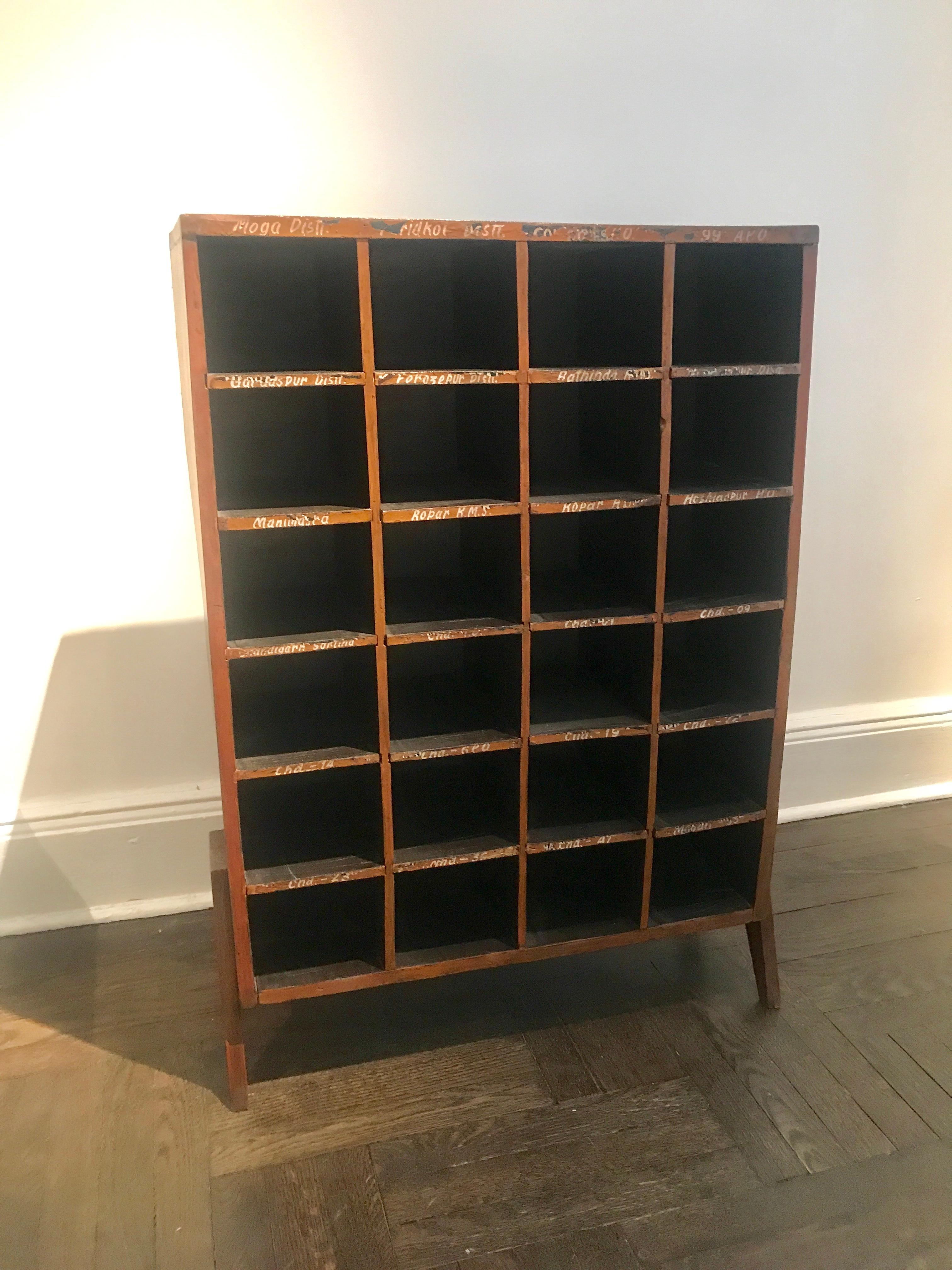 Pierre Jeanneret, circa 1960 
Post Office Cabinet in East Indian Rosewood listing the districts of Punjab, India for mail sorting. 
Provenance: Chandigarh, India.