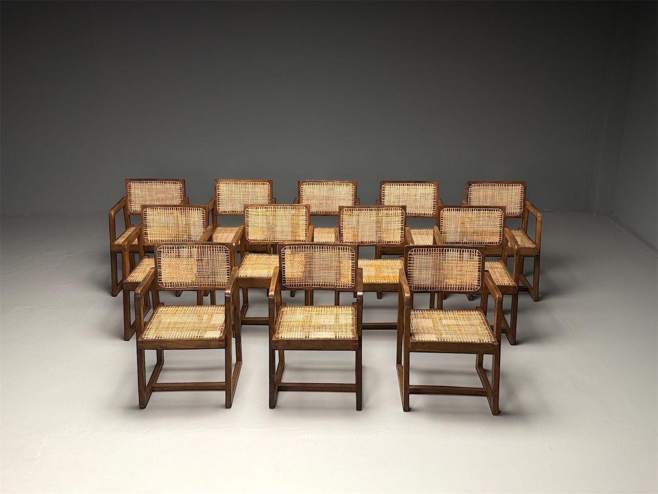 Pierre Jeanneret, French Mid-Century Modern, Box Chairs, 12 Dining Chairs, Teak, Cane, Chandigarh, India c. 1960s

Rare and important large set of twelve (12) box chairs by Pierre Jeanneret c. 1960s, Model PJ-SI-53-A. Each example comes with a two