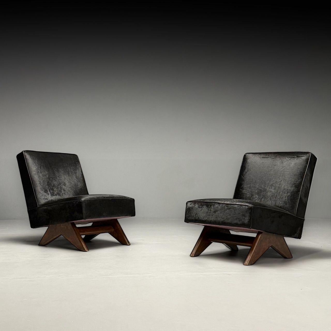 Pierre Jeanneret, French Mid-Century Modern, Slipper Chairs, Black Cowhide, Teak In Good Condition For Sale In Manhasset, NY