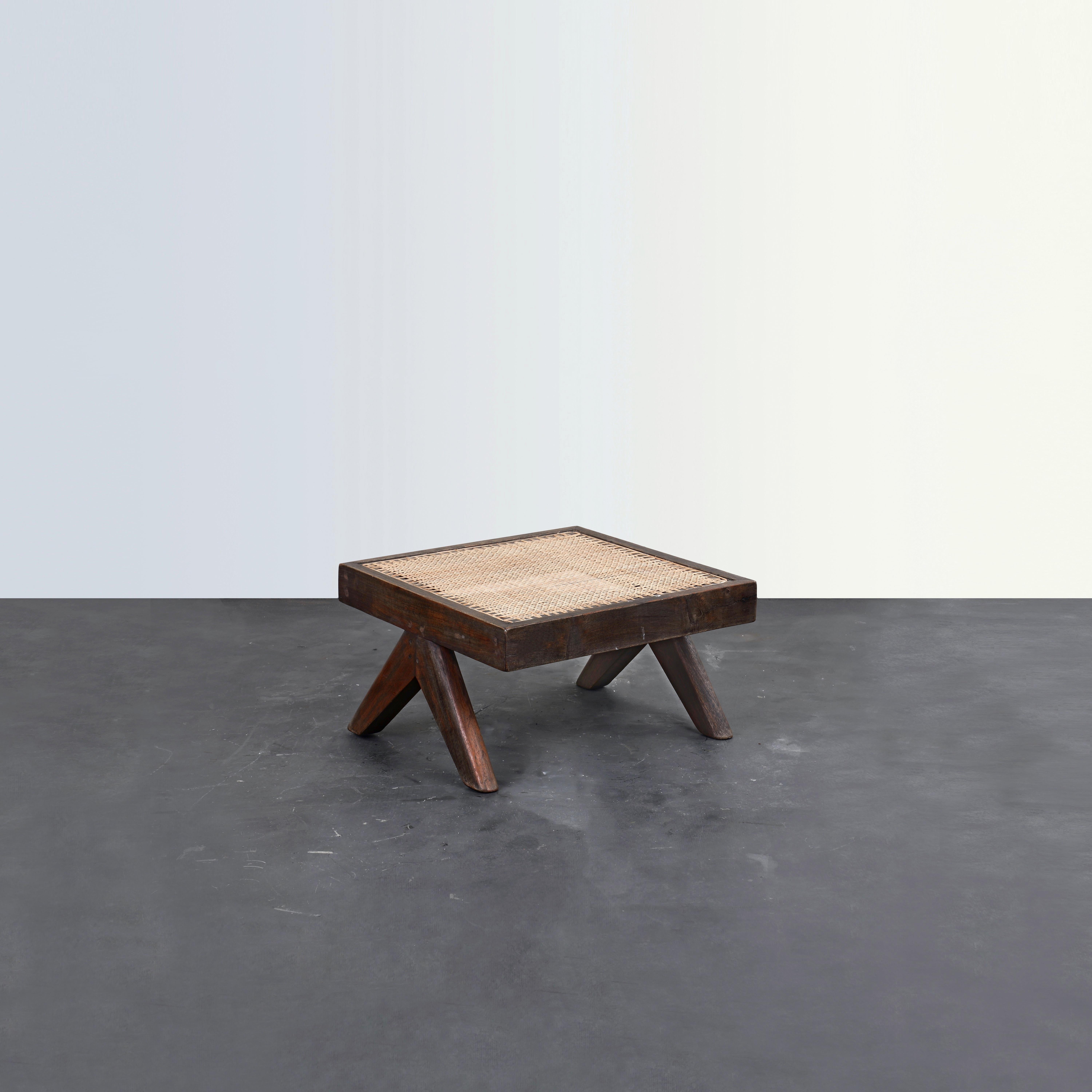 This stool is a fantastic and iconic. This is a true rarity and extremely valuable. It appears so simple and yet so precise, where proportions seem to be perfect. Its patinated teak gives that objects a strong character, showing all that traces of