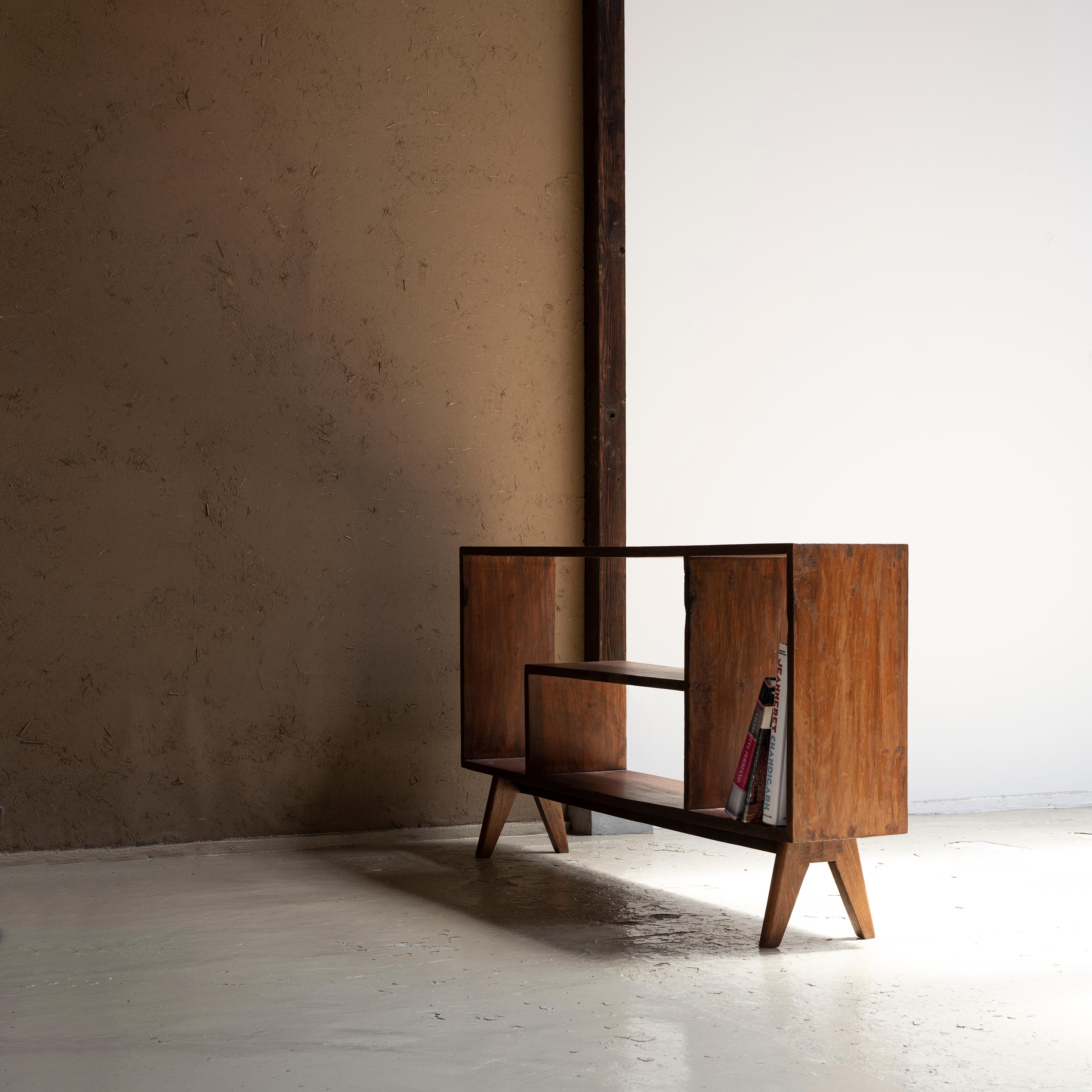 Double-sided low cupboard designed by Pierre Jeanneret in 1960s.

 Provenance: Kurukshetra University, India