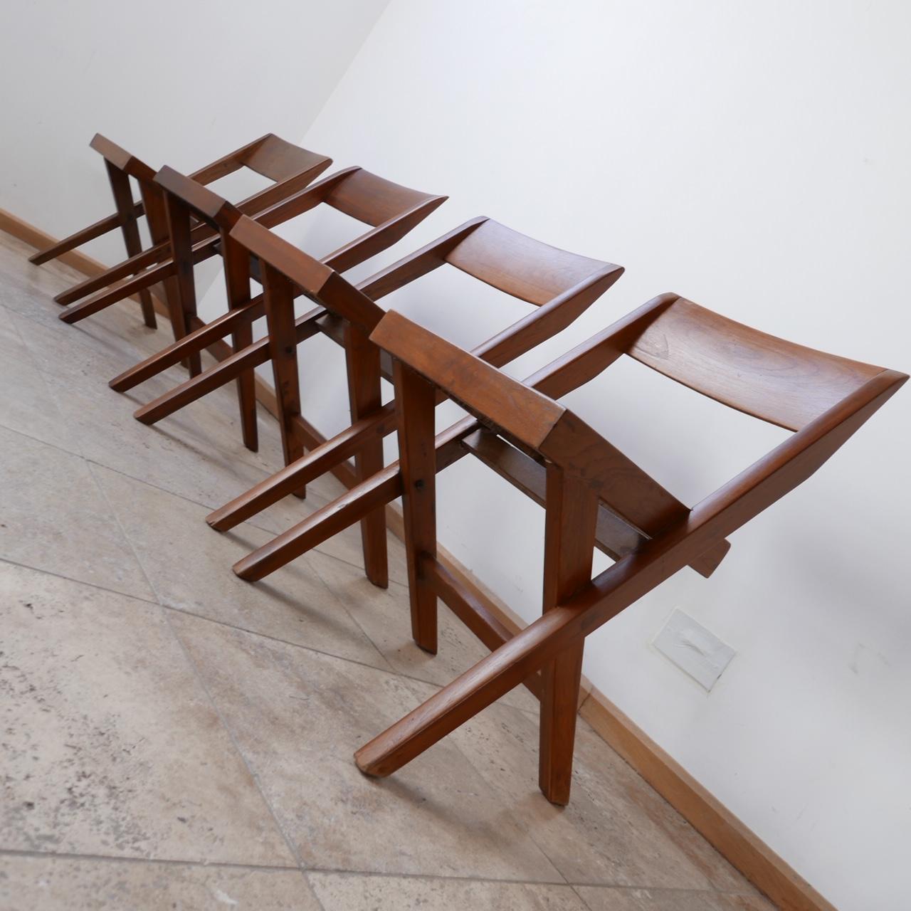 A set of four 'Library' dining chairs. 

Pierre Jeanneret, India, c1960s. 

Scarce and collectable. 

Formed in teak and cane. 

In good vintage condition, this design remains very current and sought after. 

Price is for the set of four.