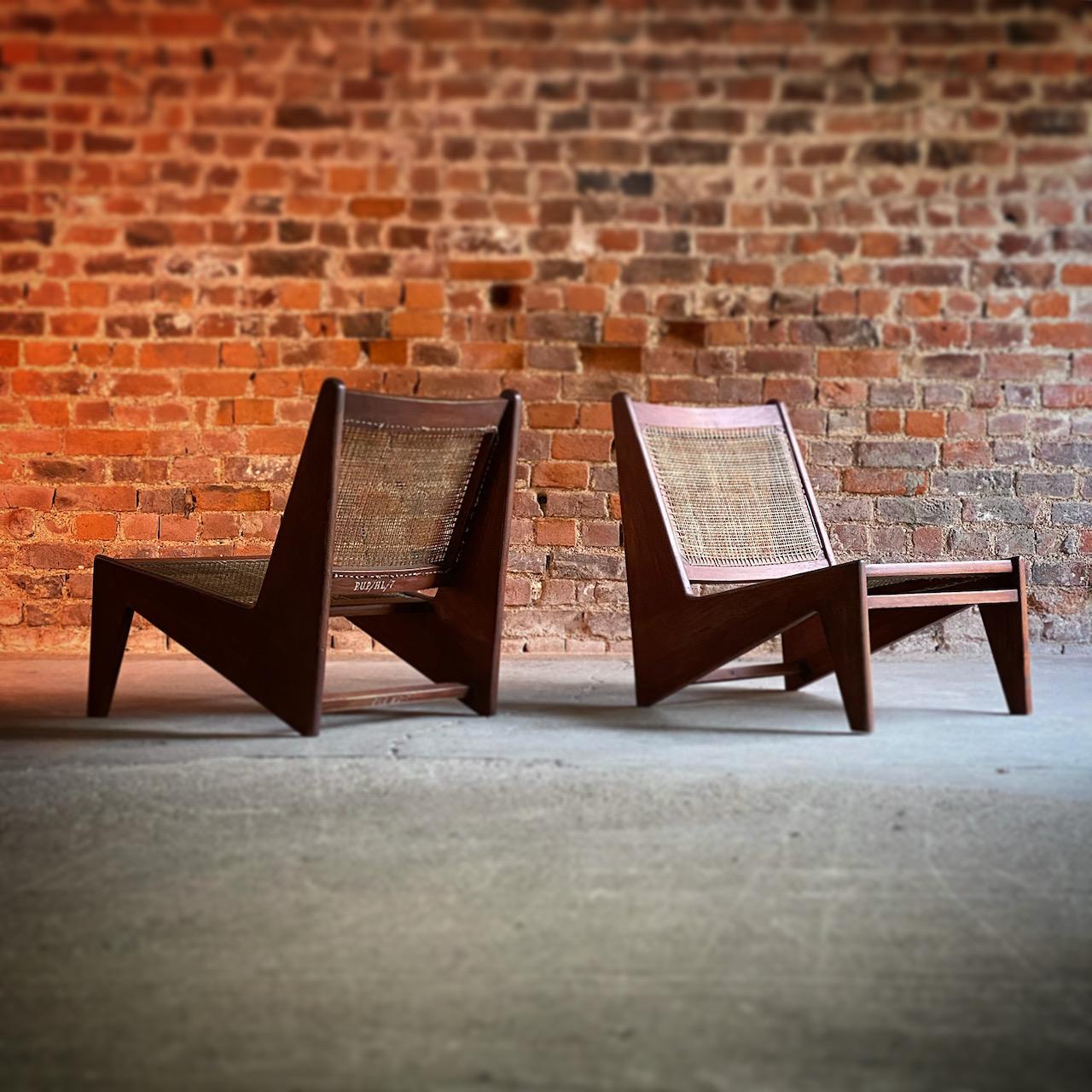 Pierre Jeanneret Model: CH010607 Kangourou Low Chairs Teak & Cane Chandigarh 

Rare pair of Pierre Jeanneret Model: CH010607 Low chairs also known as the “Kangourou