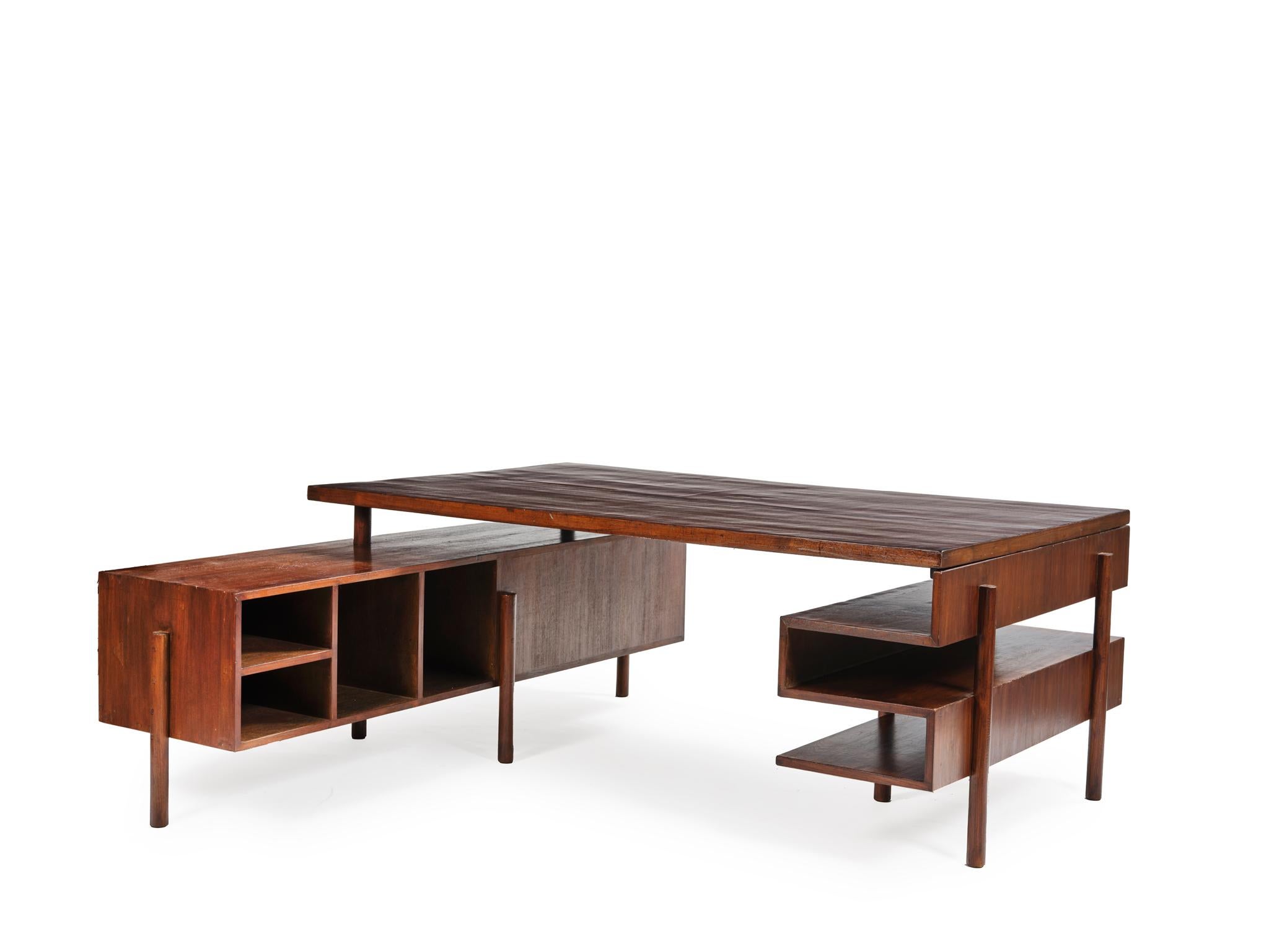 Pierre Jeanneret
PJ-BU-16-B

Important: Vintage collector's item for sale with guaranteed authenticity. 

Pierre Jeanneret
PJ-BU-16-B
Administrative desk, c. 1957-58
Dismountable version, tabletop that fits in a short drawer unit with open cabinets,
