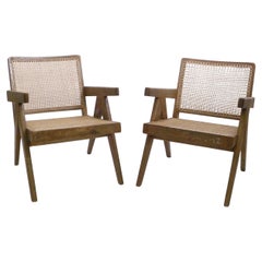 Pierre Jeanneret, Paire de fauteuils bas, teck et canne, Chandigarh Inde années 1950