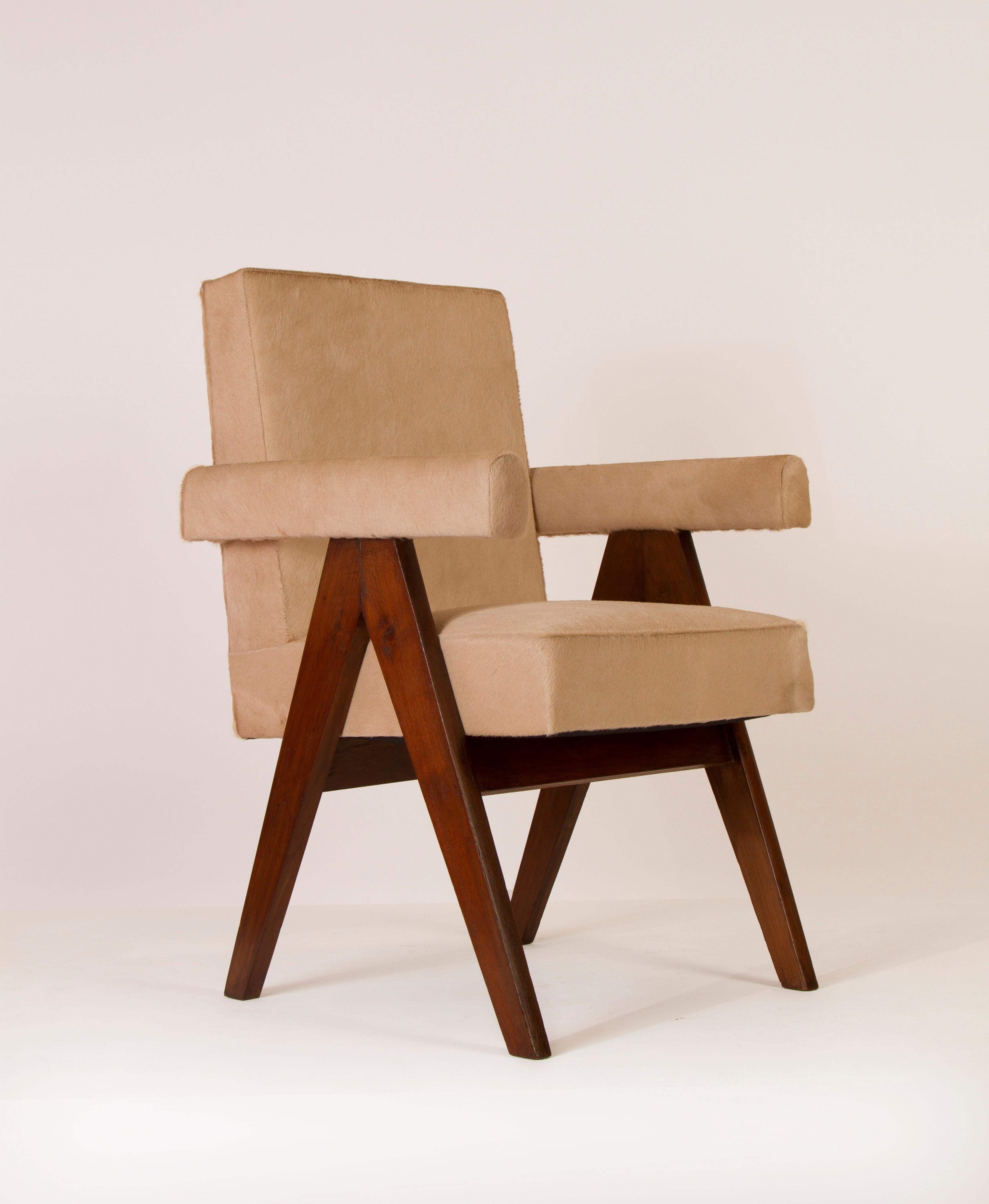 Pierre Jeanneret pair of Upholstered Commettee armchairs in teak, upholstered in cow skin.
Provenance: Assembly, High Court,  Chandigarh, India.