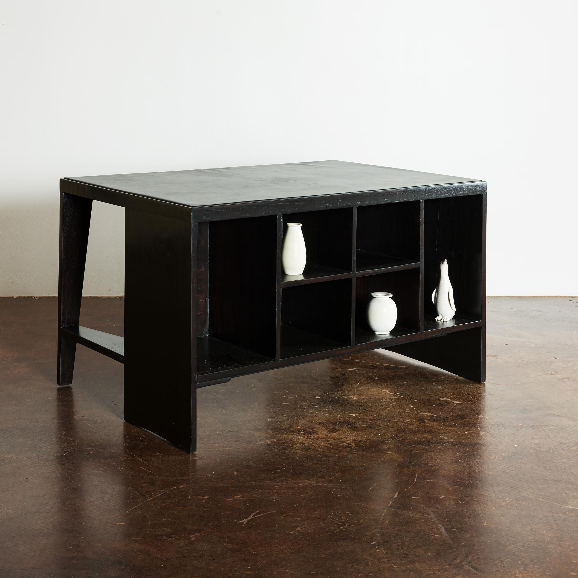 Iconic office desk in rosewood by Pierre Jeanneret for the administration buildings in Chandigarh, India, 1950s. Elegantly refinished in black stain and a black leather desktop.