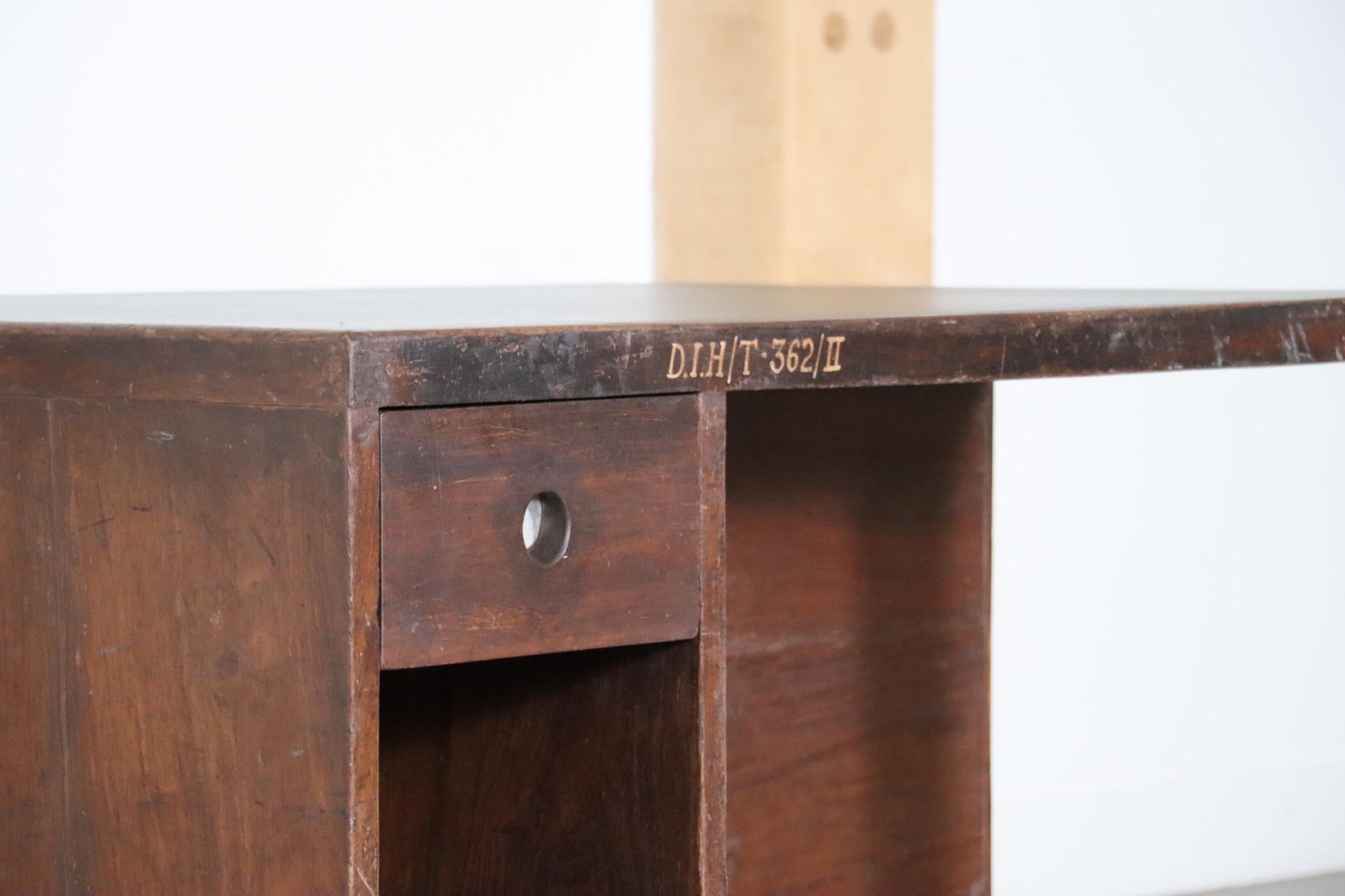 The PJ-BU-02-A “Pigeon Hole” desk by Pierre Jeanneret, India 1957.

This incredibly rare, and highly sought after design has become a legendary design by renowned designer Pierre Jeanneret. Designed to be freestanding in the room, this desk features