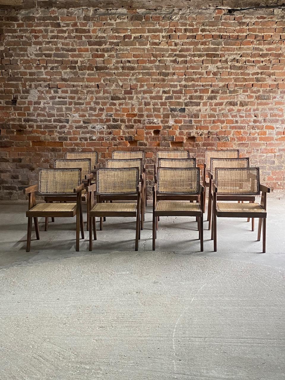 Pierre Jeanneret Model: PJ-010100T floating back office chairs set of 12 Circa 1959-60

Magnificent set of twelve Pierre Jeanneret Model: PJ-010100T teak floating Back Office Chairs, Chandigarh, India Circa 1959-60, known as 