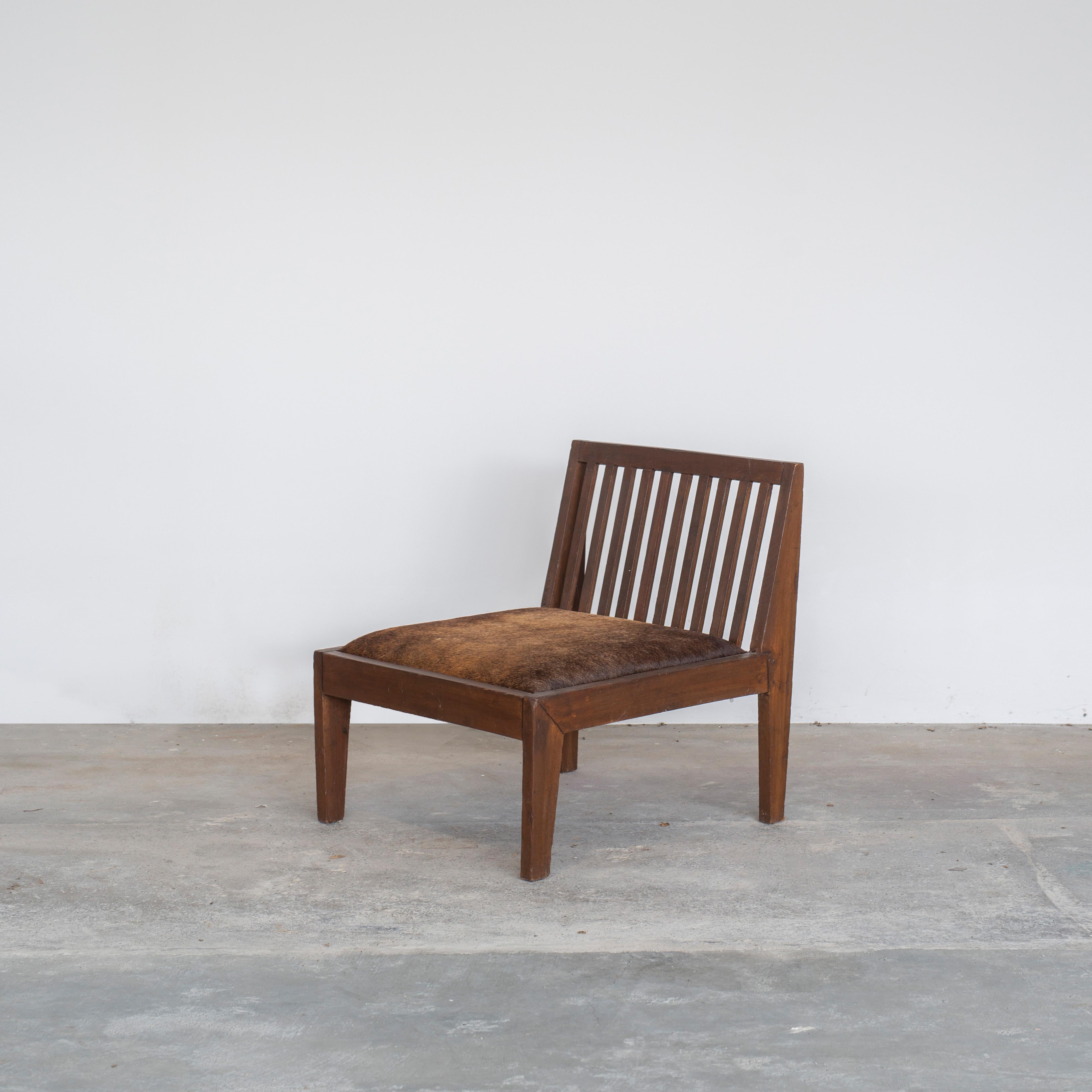 This chair with its characteristic A-shaped profile is a rare classic of history. Through its sophisticated proportions and its elegant shape, the chair represents the timeless mindset of modernist architecture and design. It consists of solid teak