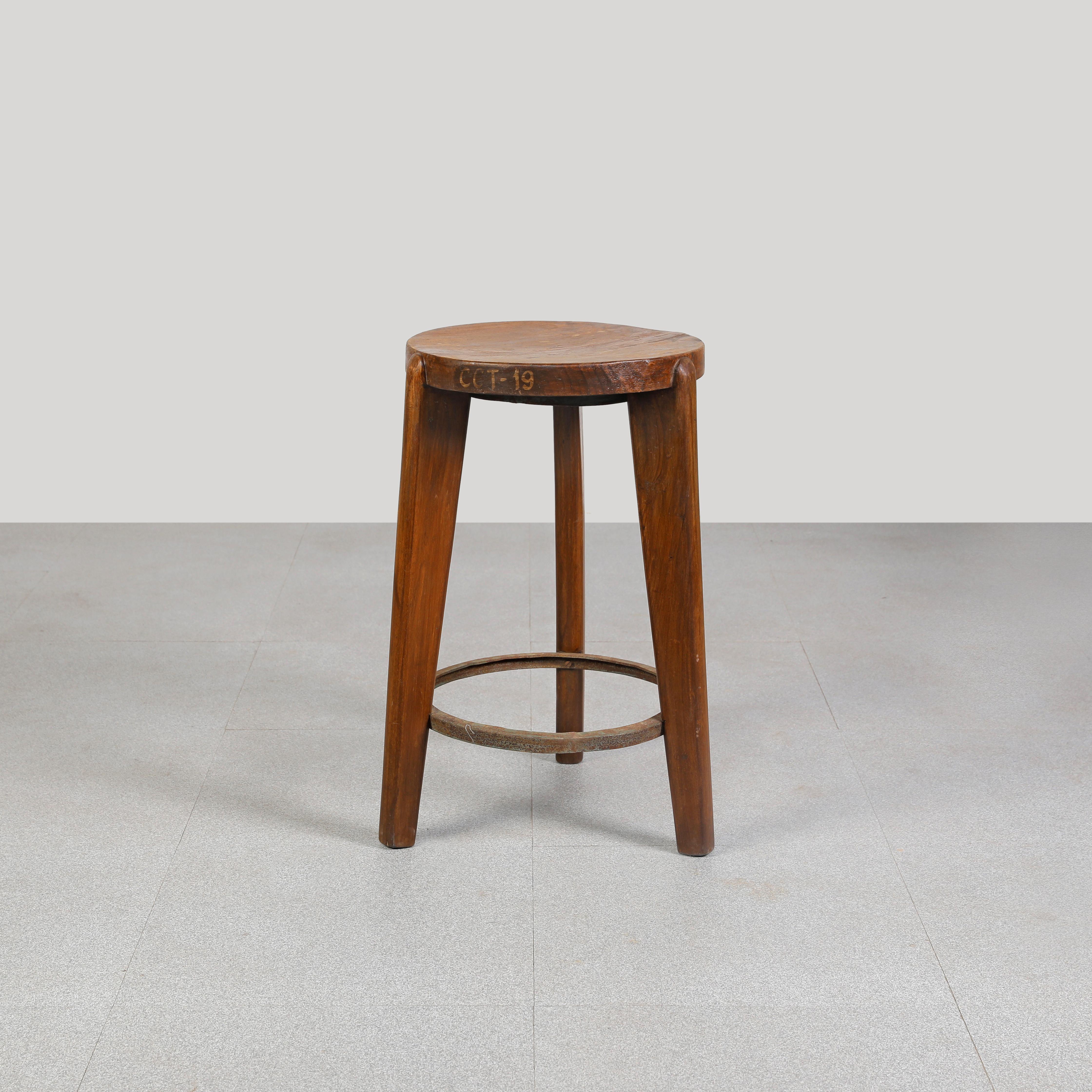 Round stool with wood seat from ca. 1965-1966. All wooden parts authentic. It has authentic letters on side which makes it even more valuable. We have more pieces to offer if you are interested to make a set. 

Authenticity:
We sell only authentic