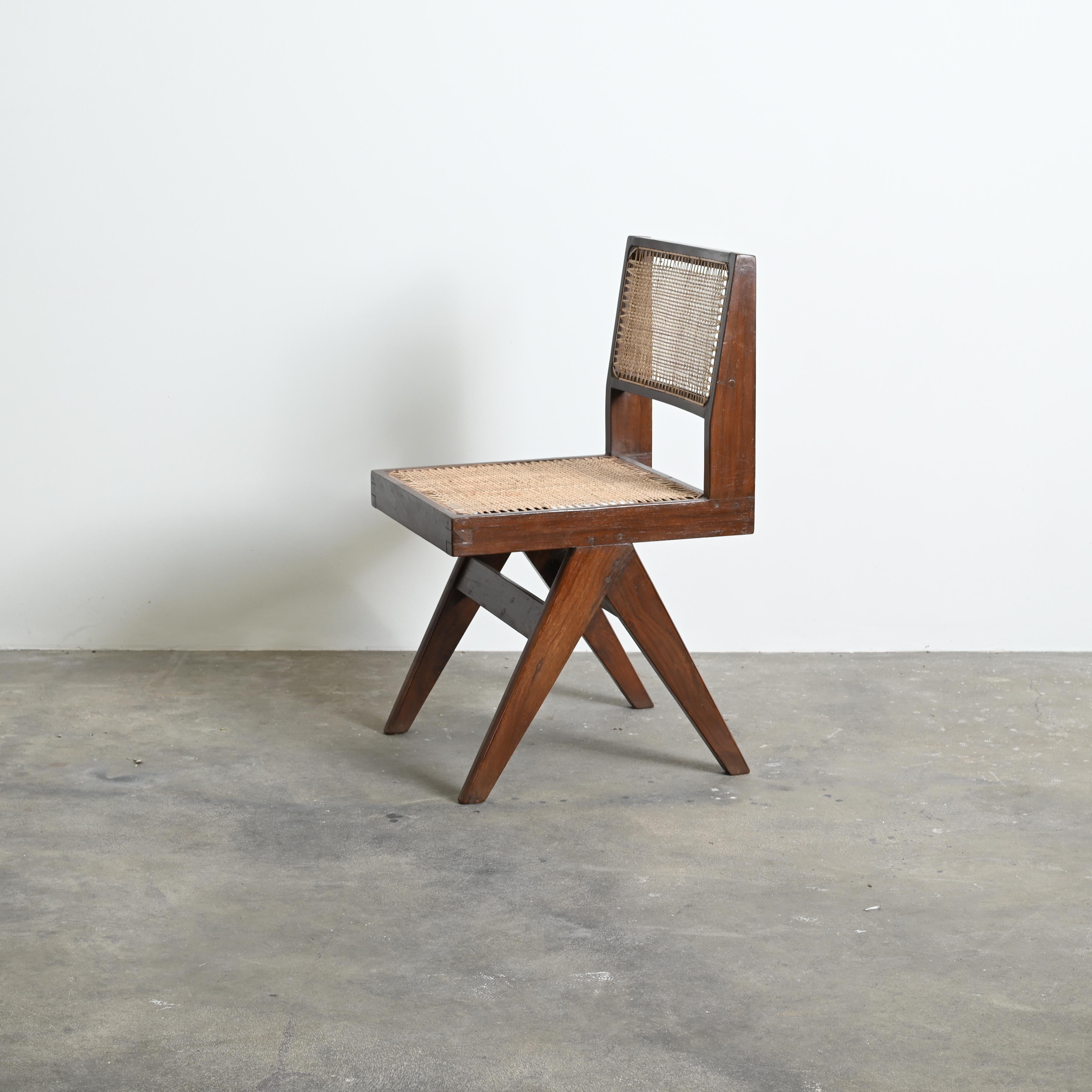 This pair of chairs are an iconic pieces. It appears so simple and still so precise, where proportions seems to be perfect. This A-shaped legs are typical for Chandigarh objects. Then this L-shaped seat, where the beams get at the ends thinner. It