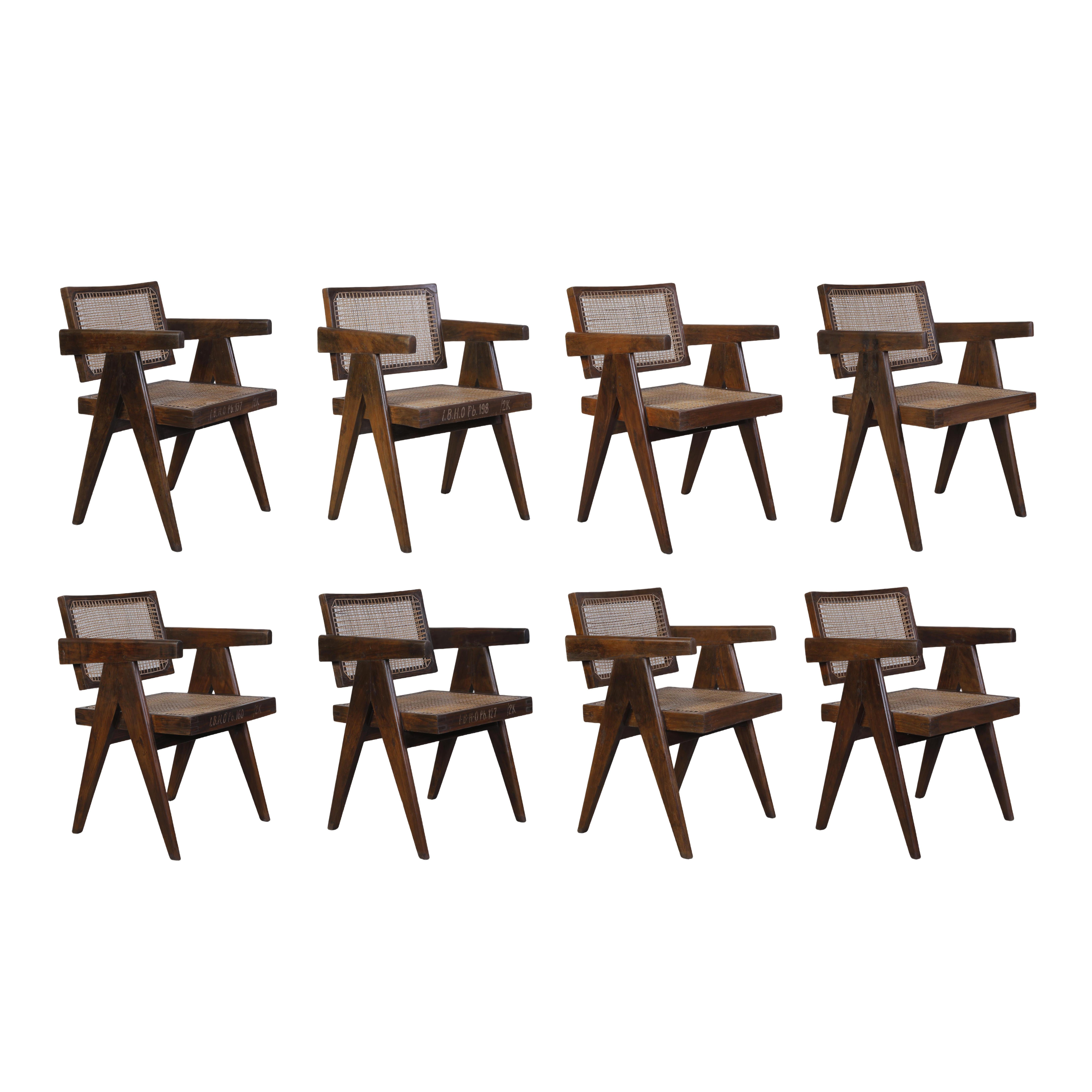 We offer a set of 8 authentic Pierre Jeanneret dining chairs (we offer 6, 10 or 12 too). Normally they are always a bit different in size, so they normally never fit. That is a rare set where dimensions are very similar. So that is a rare