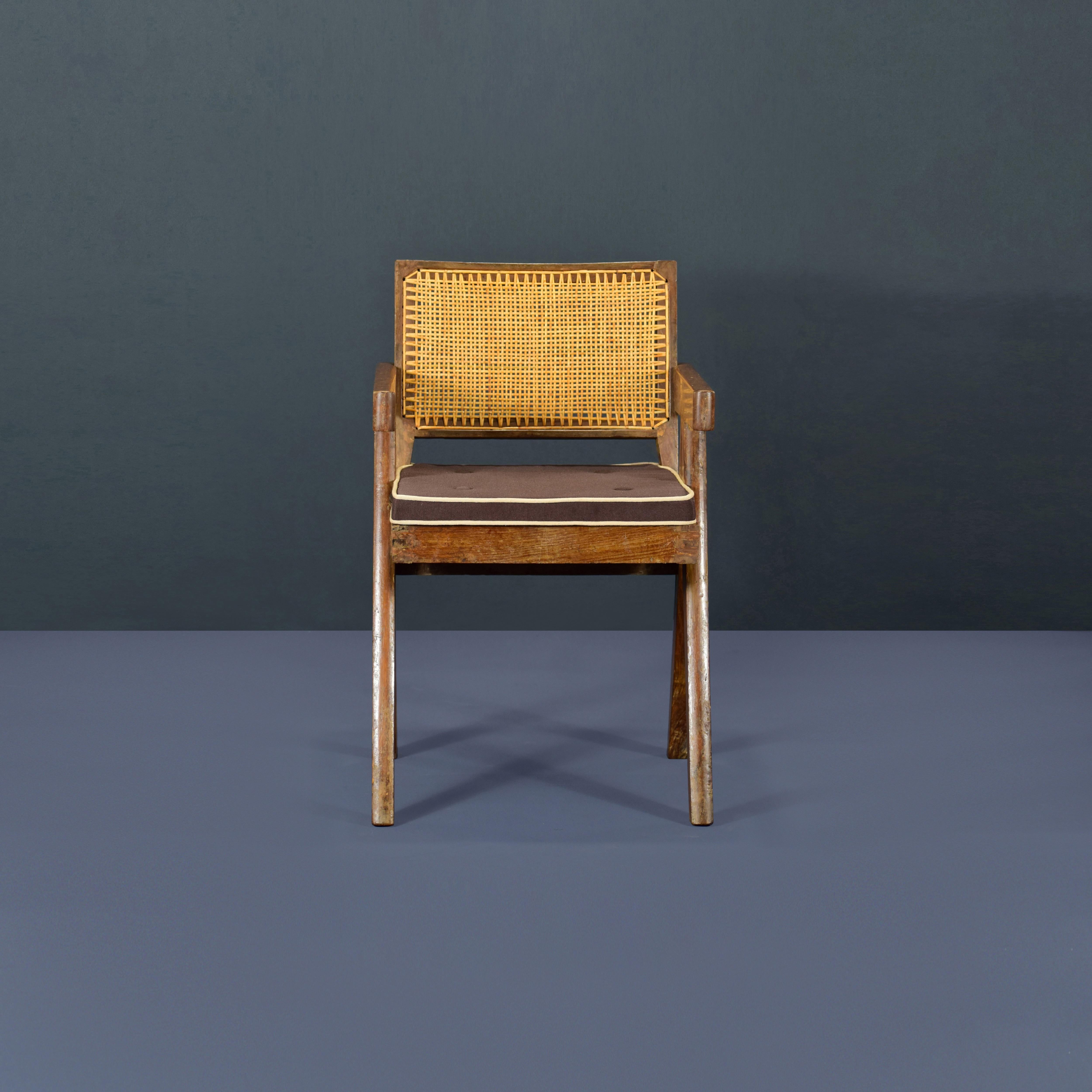 Chair has patinated teak, which gives that chairs a strong character, showing all that traces of age and its uniqueness. They are finally historic pieces from a UNESCO World Heritage site, done by the most important architects of the 20th century.