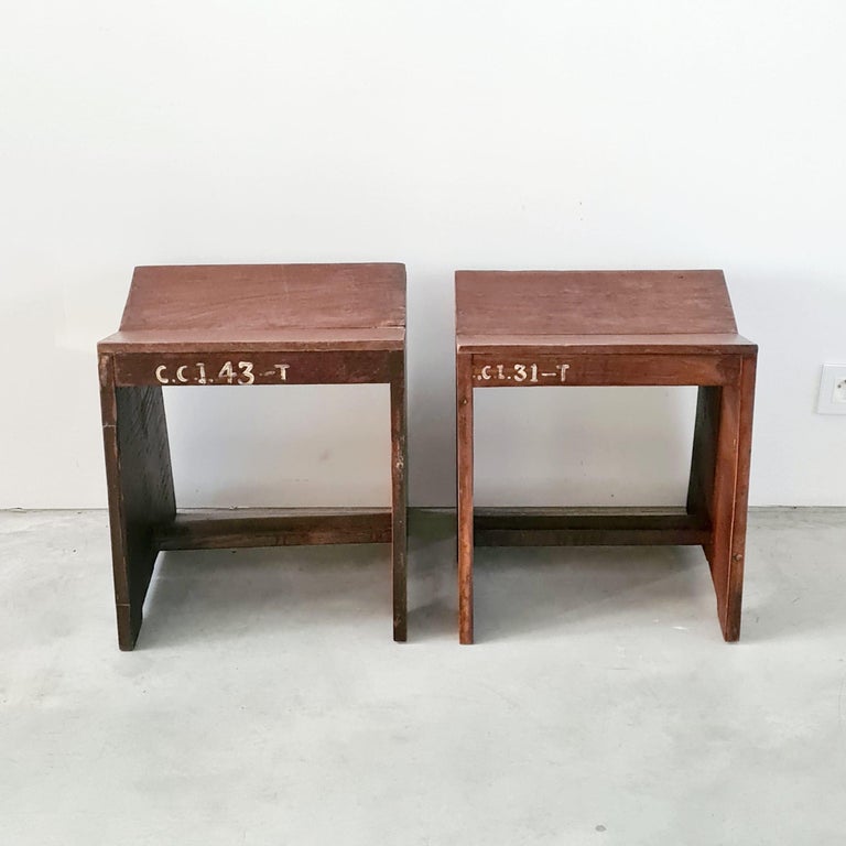 A pair of wildly stylish original Pierre Jeanneret 'sewing' stools. 

Model PJ-SI-68-A low stools

Chandigarh, India, c1950s. 

Solid teak, original lettering, sympathetically restored. 

Price is for the pair. 

Restoration photos