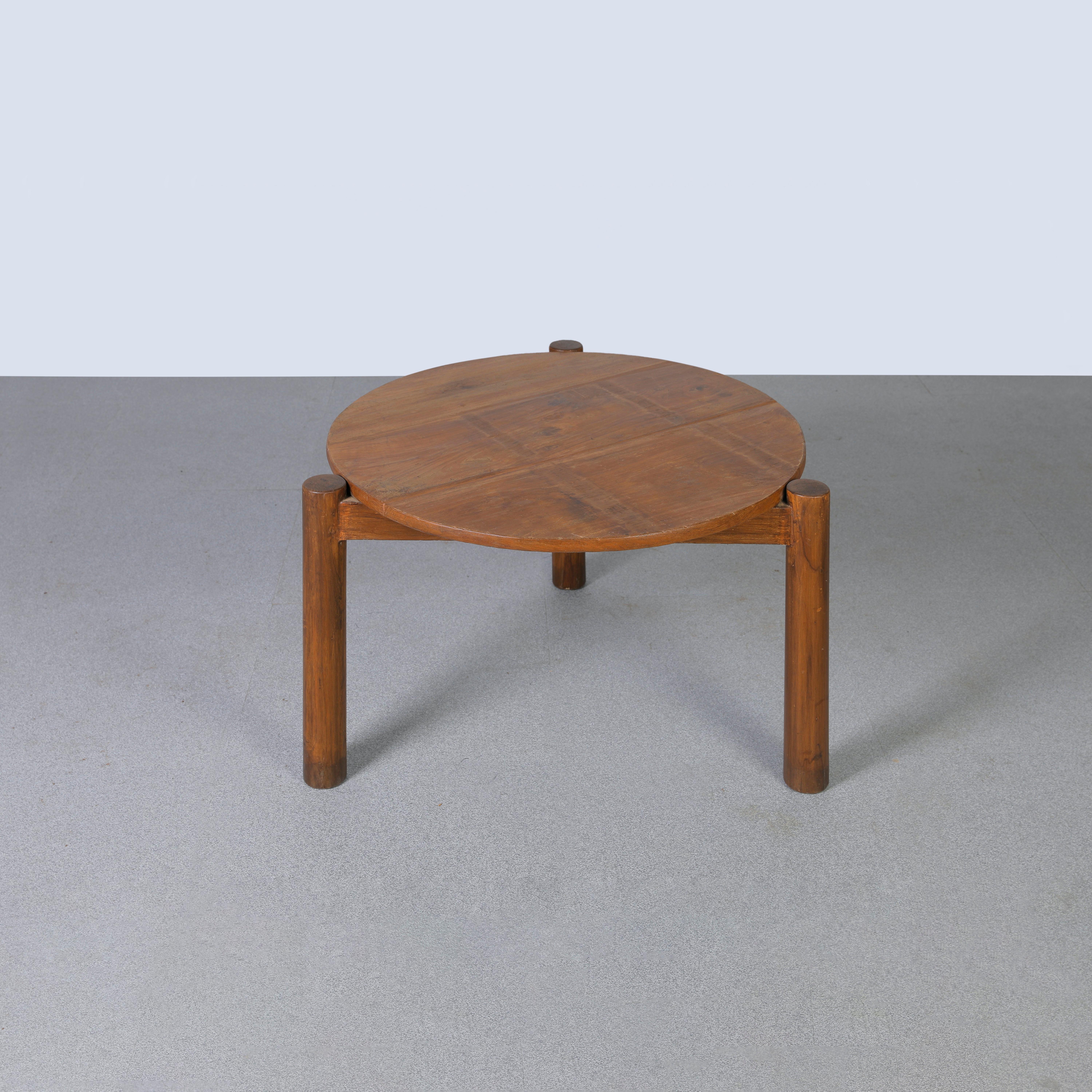 This low round table is an iconic design piece. It is raw in its simplicity and it shows a slightly patinated material. Its shape is beautifully fragile and has a wonderful colour. We don't restore them too much. So we keep as much as possible of