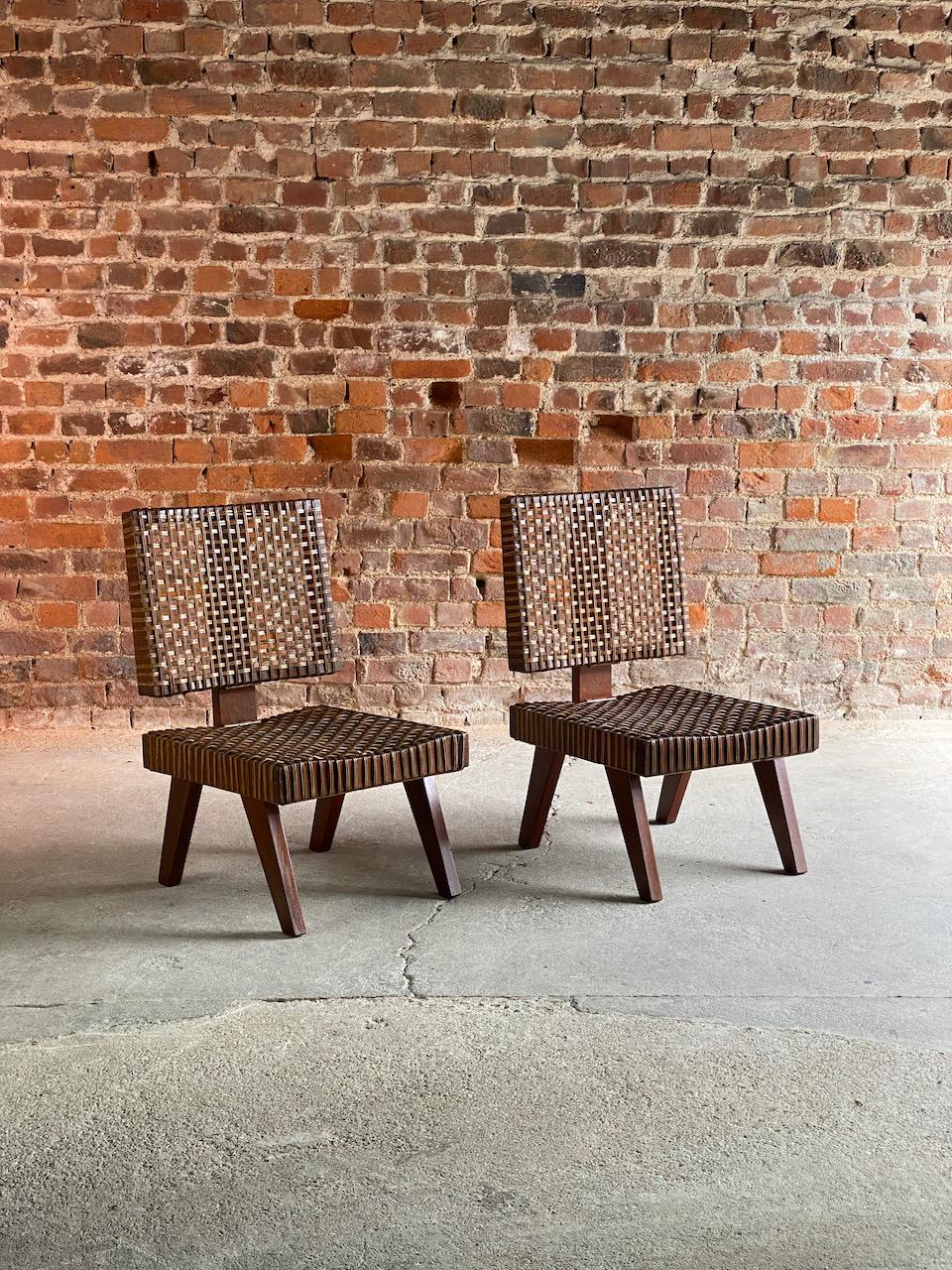 Pierre Jeanneret rare lounge chairs Chandigarh Circa 1955-56

Magnificent and important mid twentieth century Pierre Jeanneret (1896 - 1967) rare Lounge Chairs Oak and Cane Chandigarh, India Circa 1955-56, very few examples of this chair design