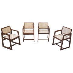 Pierre Jeanneret Rare set of 4 Cane Back Office Chairs with original Letterings