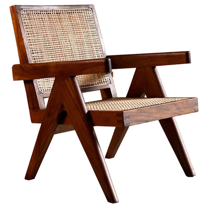 Pierre Jeanneret rosewood low easy armchair Model PJ-SI-29-A, circa 1955

Pierre Jeanneret Model no. PJ-SI-29-A Sissoo Rosewood ‘Low Easy’ armchair circa 1955, the seat and back in woven cane, the inverted V shaped legs supports supporting the arm