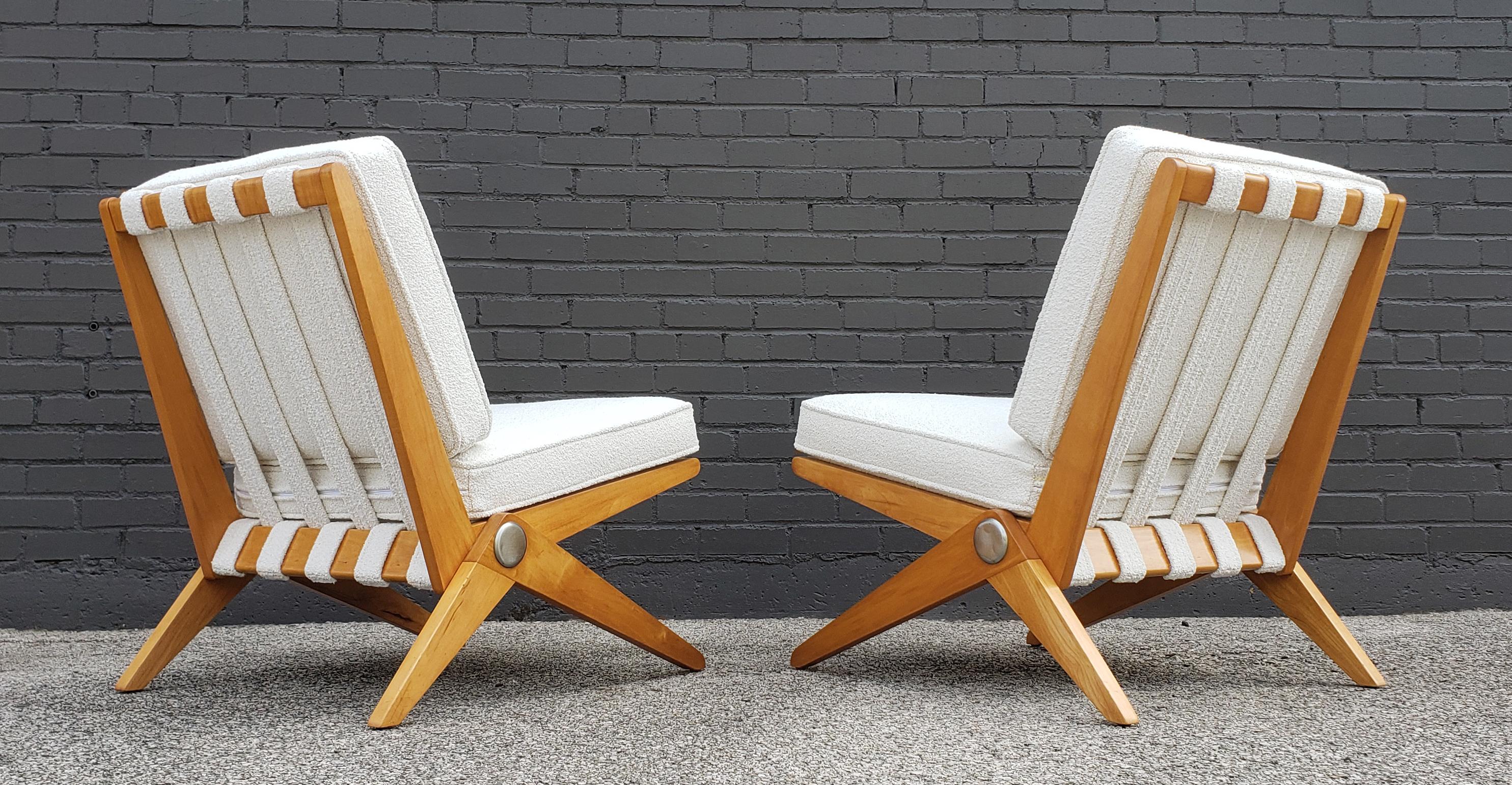 Rare and early pair of Scissor Lounge chairs designed by Pierre Jeanneret in 1948 and produced by Knoll and Associates, circa 1955. The frames have been disassembled and re-glued and re-trued for structural integrity. Fully refinished in a