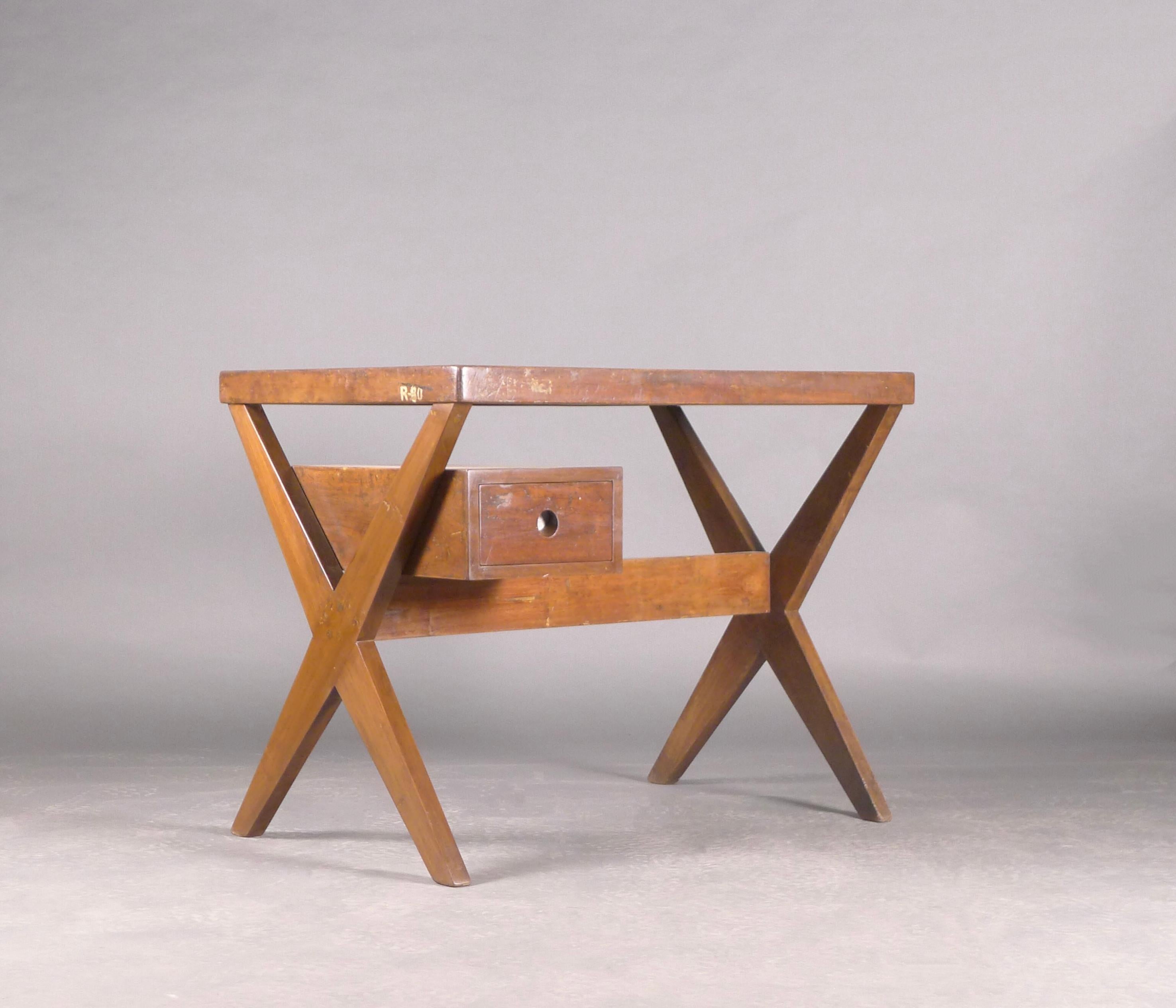 Pierre Jeanneret (1896-1967)
Secretariat Desk, also known as Steno's Desk 
model PJ-TA-12-A, designed for offices in Chandigarh, India
36in (91.5cm) wide, 24in (61cm) deep, 28in (71.25cm) high

Constructed in teak with X legs, the desk has one