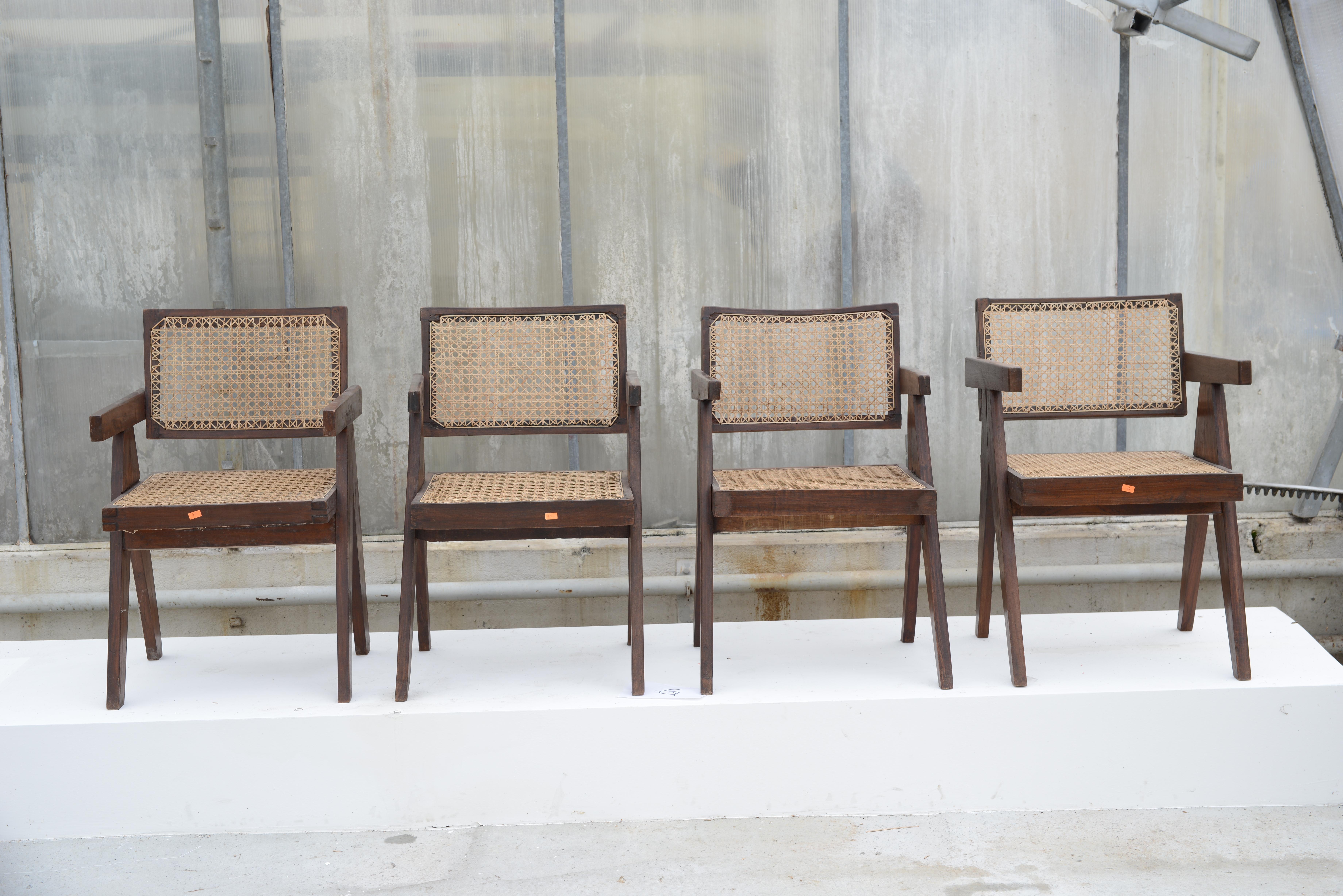 We offer a set of 4 authentic Jeanneret dining chairs. Normally they are always a bit different in size, so they normally never fit. This is a rare set where dimensions are very similar which is a rare opportunity. If you're interested in more