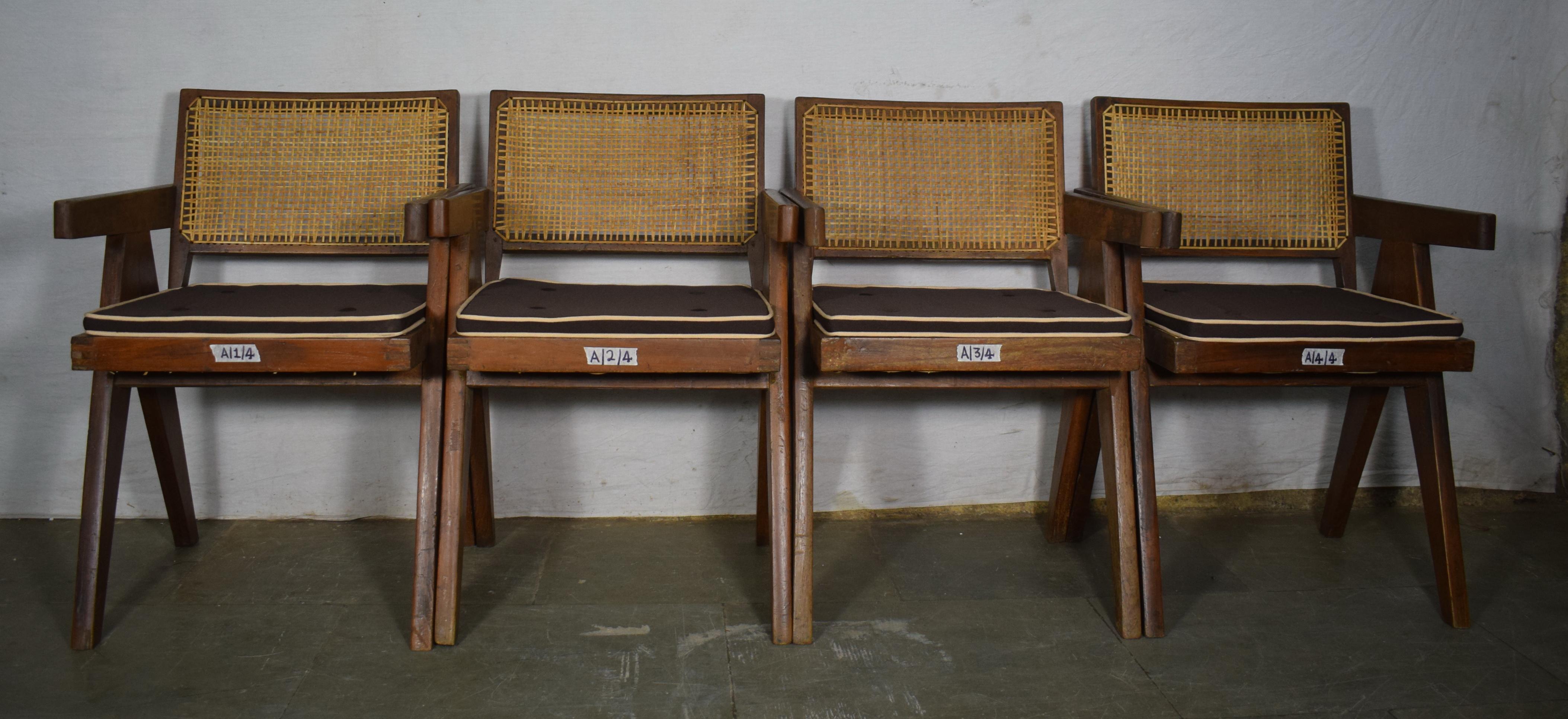 We offer a set of 4 authentic Jeanneret dining chairs. Normally they are always a bit different in size, so they normally never fit. This is a rare set where dimensions are very similar which is a rare opportunity. If you're interested in more