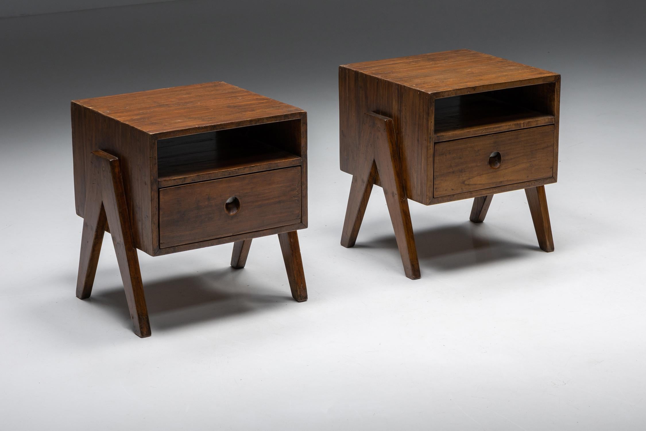 Pierre Jeanneret, Solid Teak Bedside Table, Chandigarh, Le Corbusier, 1955

These bedside tables, designed by Pierre Jeanneret, are made of solid teak. The quadrangular body consists of an open compartment at the top, and a single drawer at the