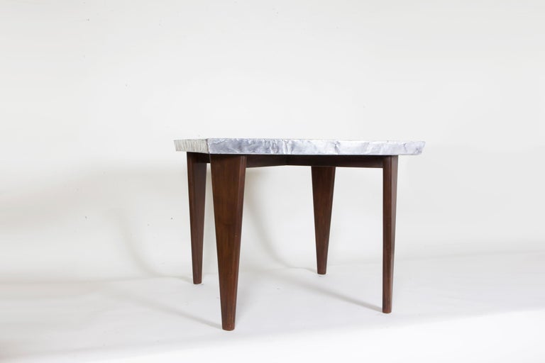 Pierre Jeanneret (1896-1967)
Square table, circa 1955
Measures: 28 H x 37 W x 37 D inches
71.1 H x 94 W x 94 D cm

Provenance Chandigarh, India.