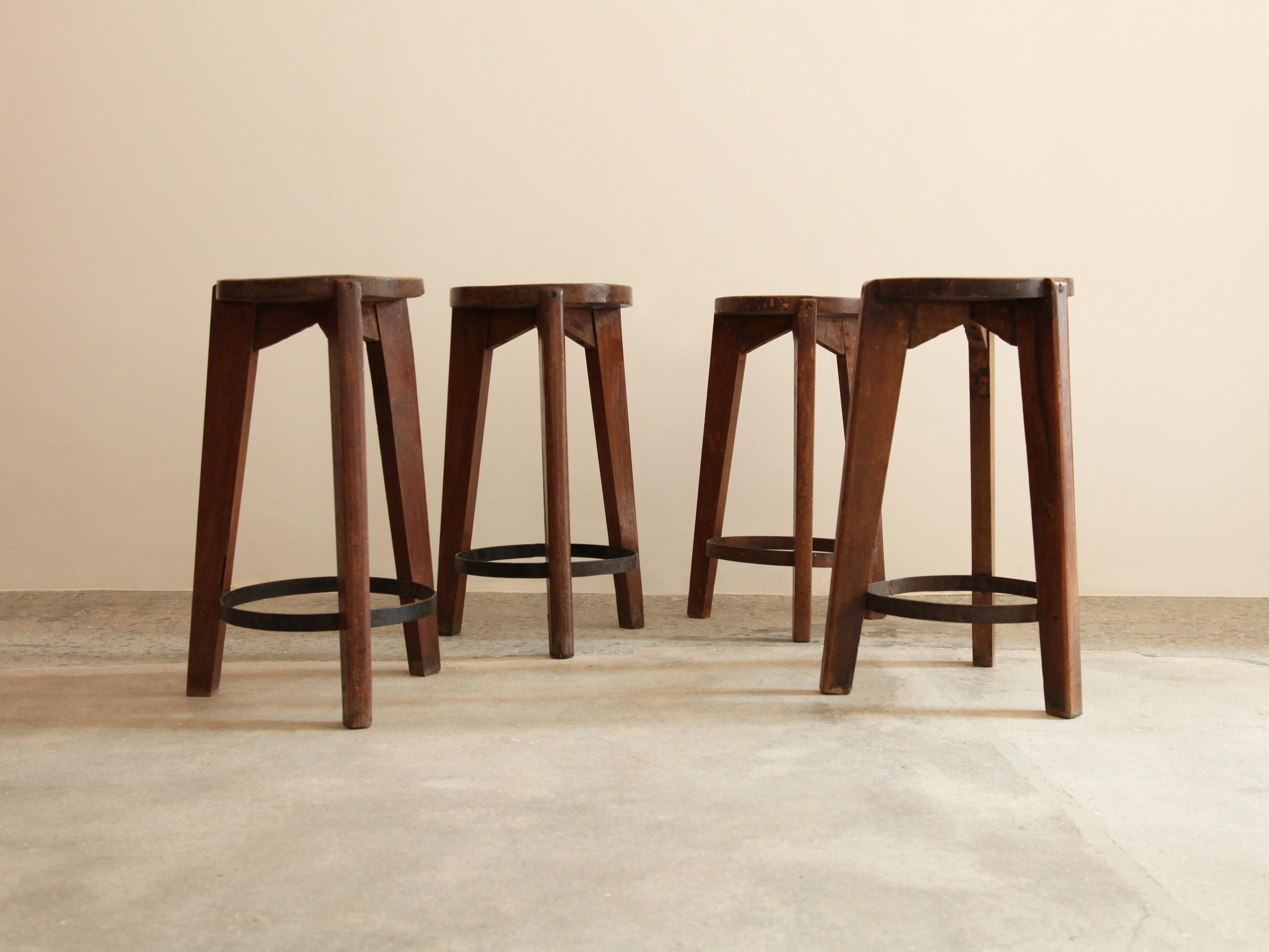Set of four tall counter stools from Punjab University, Chandigarh, circa 1965. Incredible original patina. Sold in pairs.

Literature: Le Corbusier Pierre Jeanneret: The Indian Adventure, Design-Art-Architecture, Touchaleaume and Moreau, pg. 560.