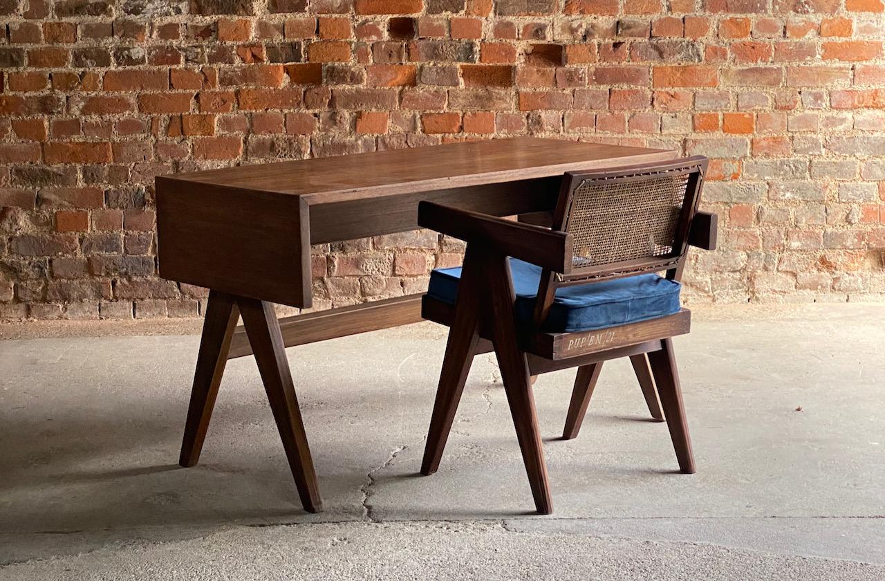Pierre Jeanneret Student Library Desk  & V Leg Chair Chandigarh 

Magnificent re edition Pierre Jeanneret (1896-1967) design library student desk and fixed back V leg conference chair from the college of architecture, Chandigarh after the original