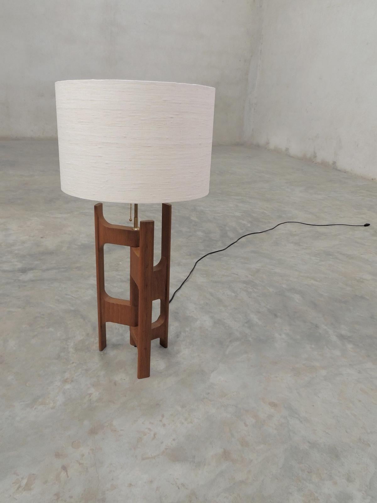 Sculptural organic modern table lamp. 


Dimensions (cm): Height 81.5 x 40.0 diameter
Material: Natural teak



 

   