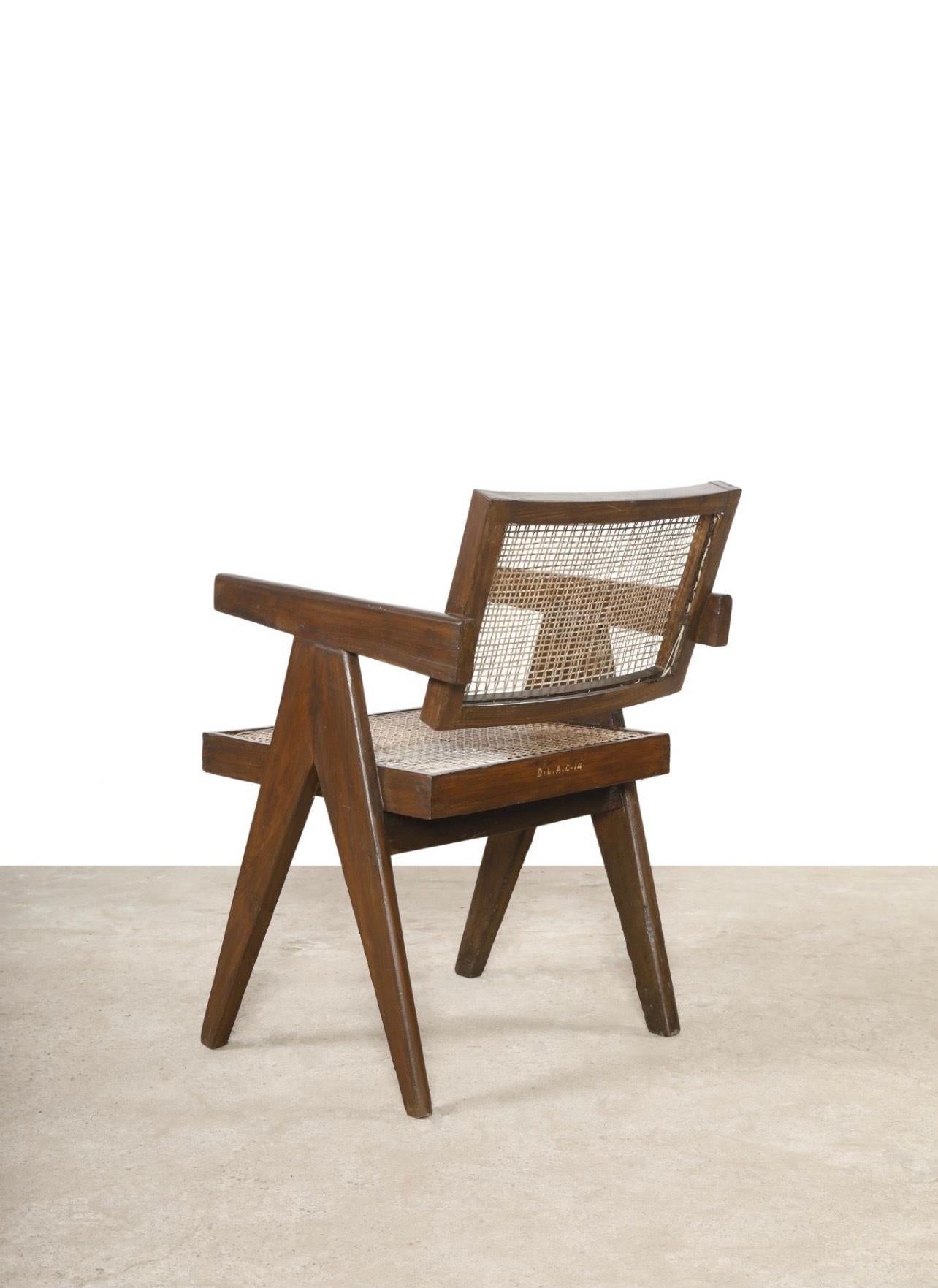 A single teak office chair by Pierre Jeanneret (1896-1967) from Chandigarh, India.
Cane seat and back, circa 1952.
Signs of use and wear attribute is originality.

Documented E. Touchaleaume G. Moreau Le Corbusier, Pierre Jeanneret, L'Aventure