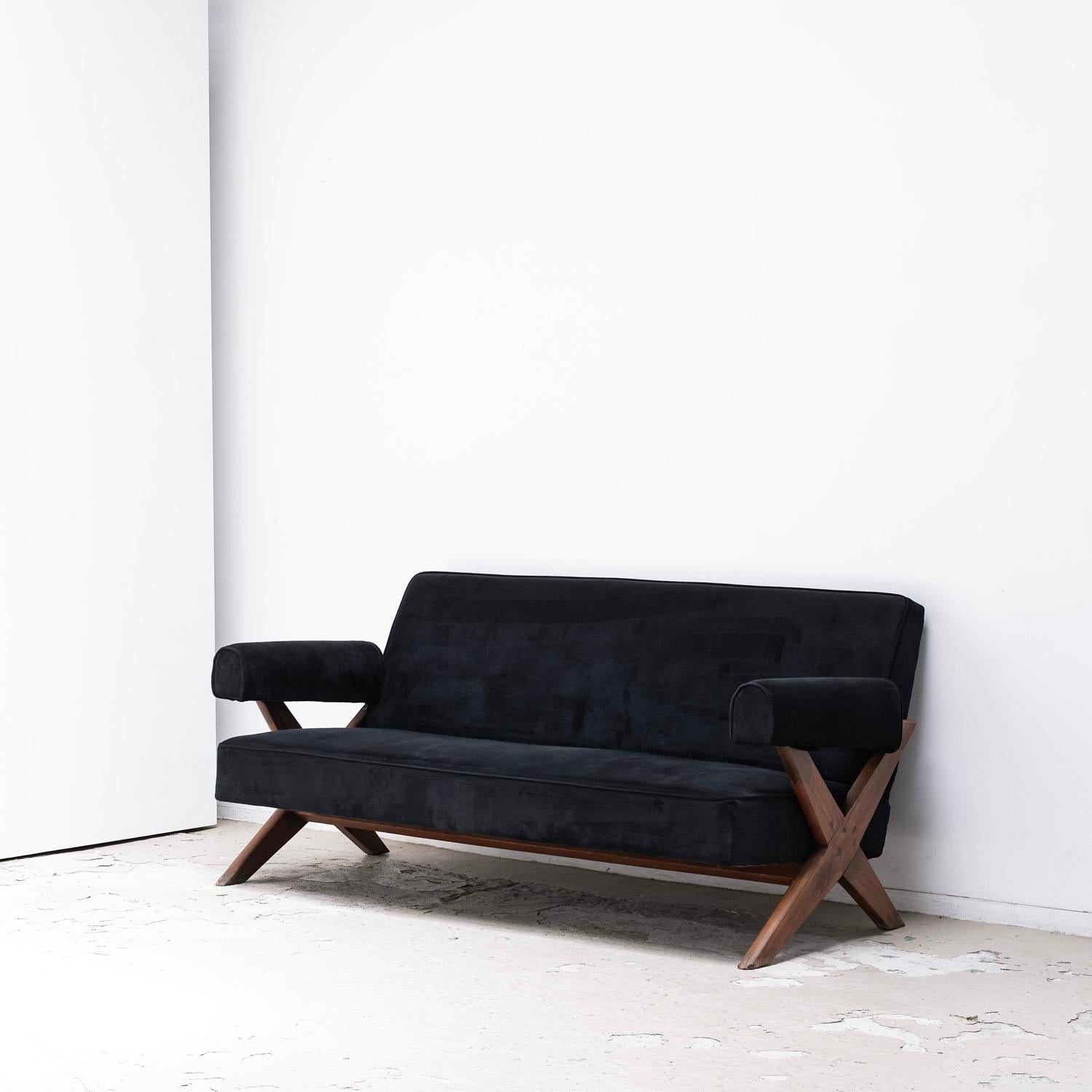 This sofa by Pierre Jeanneret , 1960s.
This  sofa is newly upholstered in black velvet .

provenance : skating ring(UT) in sports complex Chandigarh