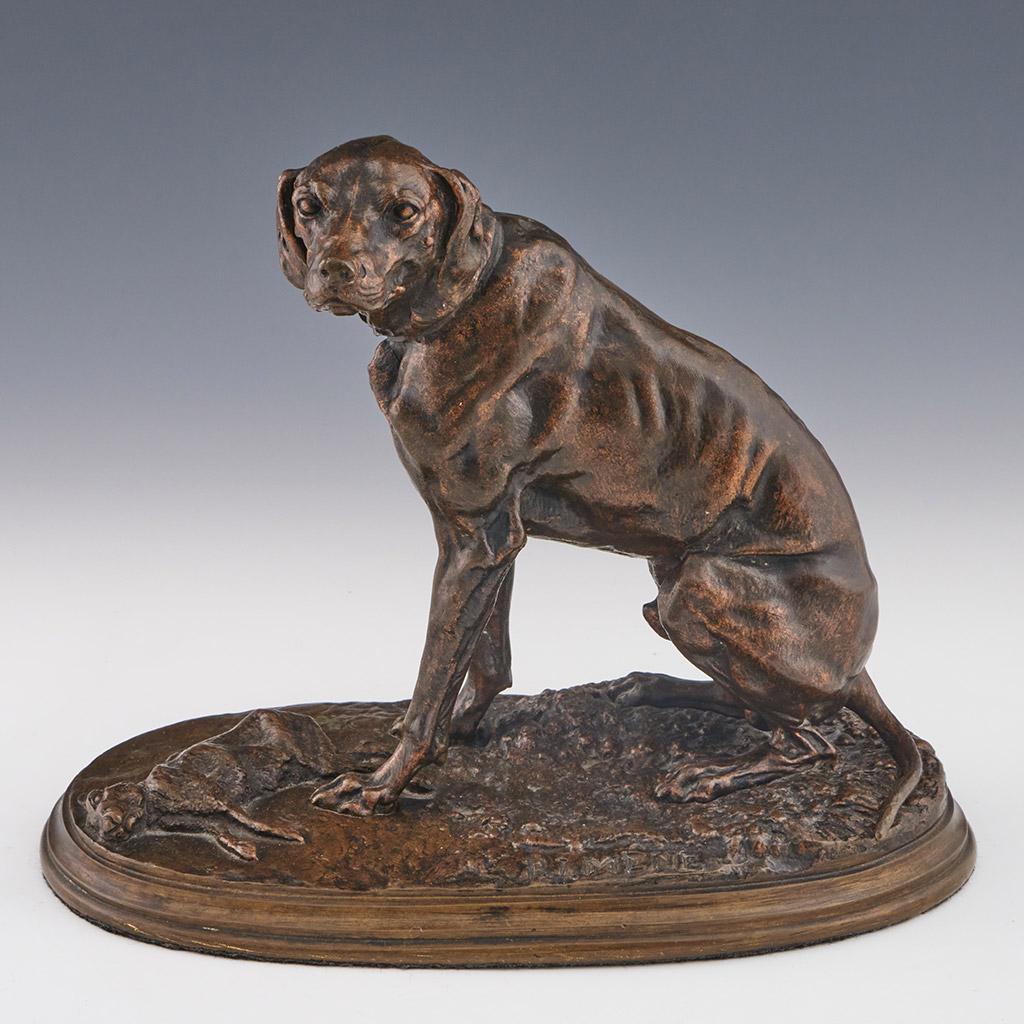 A mid-19th century bronze study of a sitting hound with a hare at their feet. Excellent light brown patination. Signed 'P J Mene' to naturalistic base. 

Pierre- Jules Mêne was born in 1810 and worked as a teenager for his father as a metal
