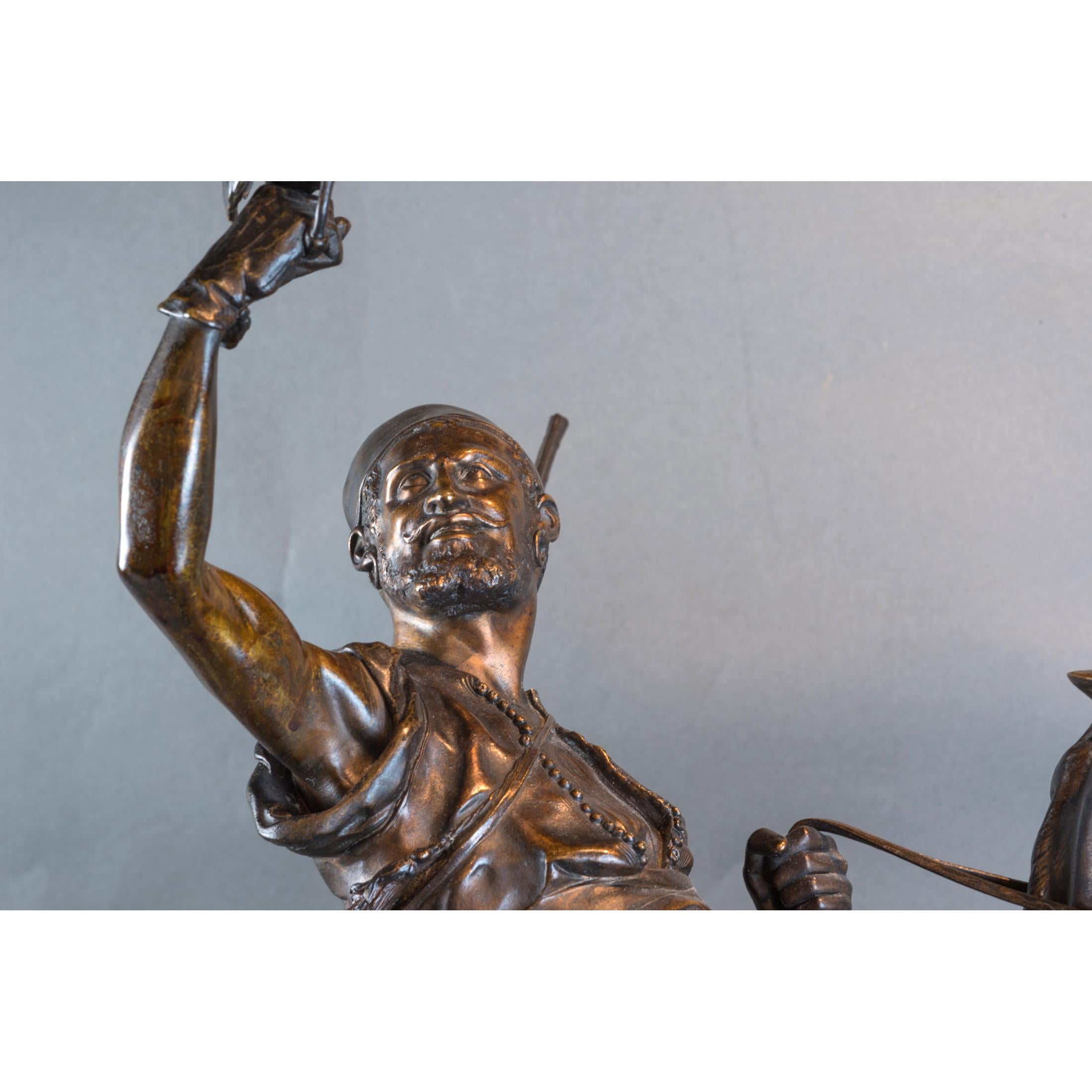 A Fine Patinated Bronze of a Berber Falconer on Horseman  - Gold Figurative Sculpture by Pierre Jules Mêne