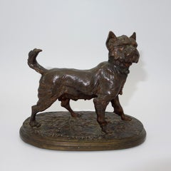 Antique A French animalier bronze of a terrier signed P.J. Mêne.