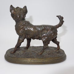 Un bronze animalier français représentant un terrier signé P.J. Mne.