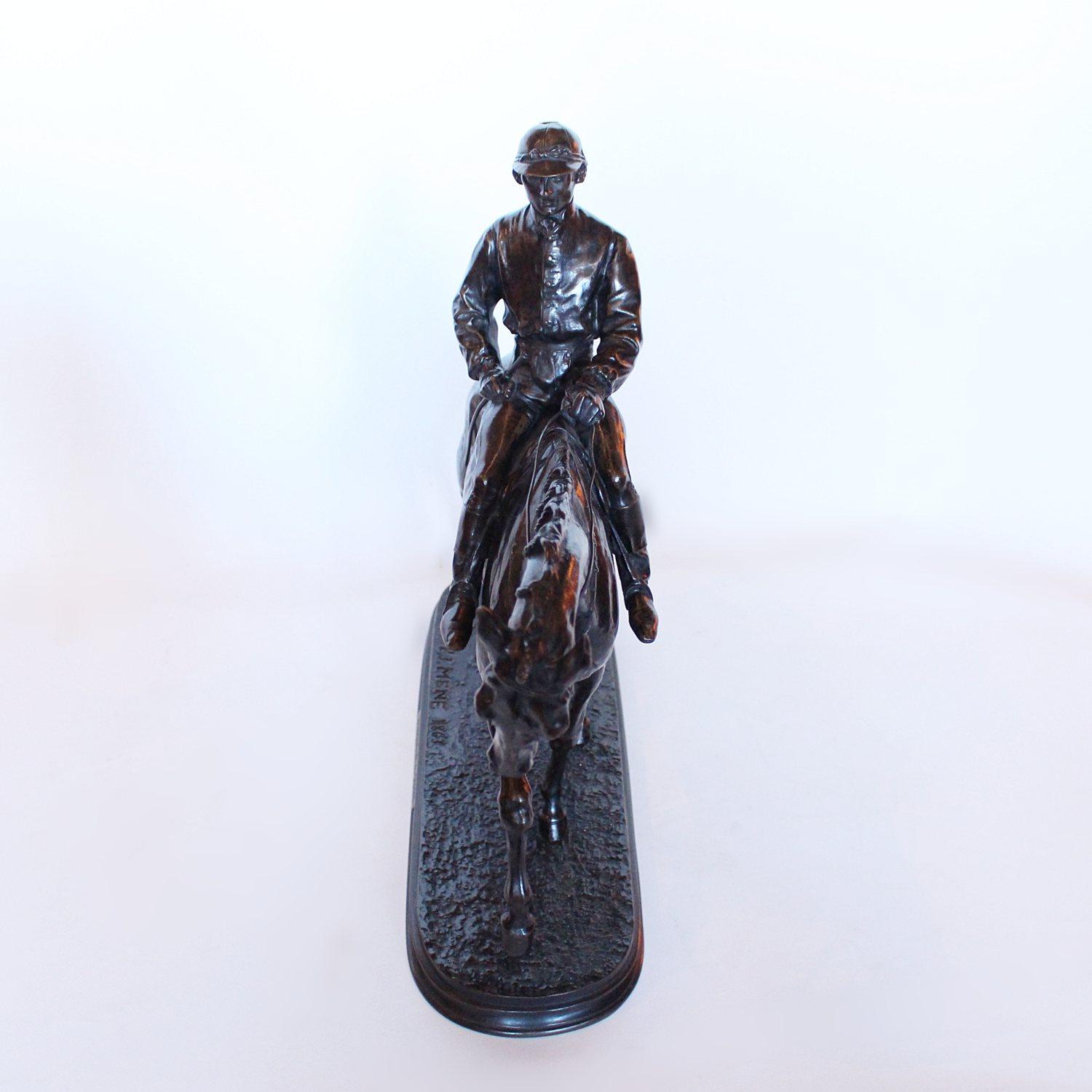 Vainqueur du Derby (Jockey à Cheval), a 19th century light and dark brown patinated bronze study of a jockey walking his horse in after a race. Finely hand chased detail. Set over a naturalistic, integral plinth. Signed P.J.Mêne 1863. 

Artist: