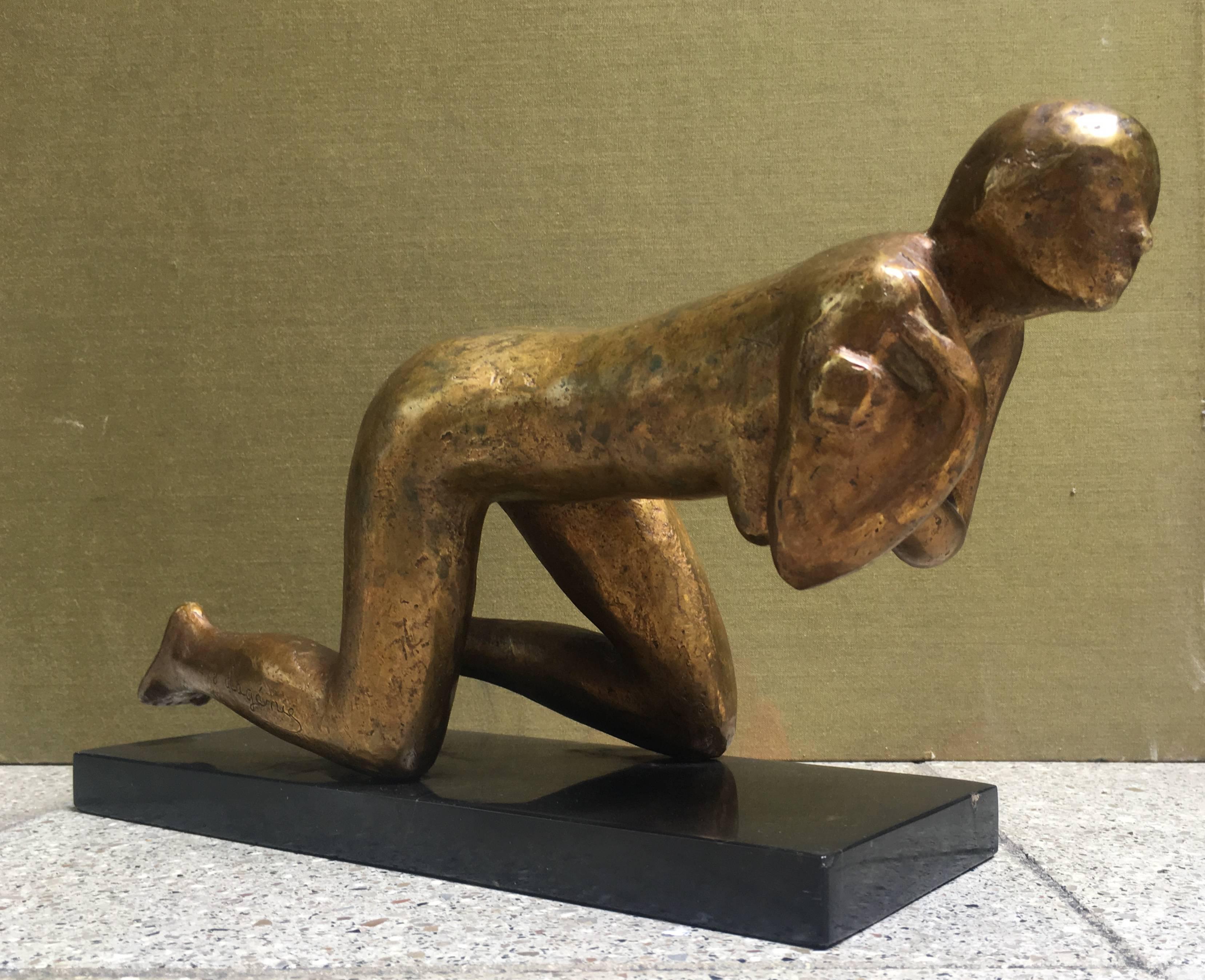 Pierre Lagenie (born in 1938) 
Bronze representing a kneeled woman.
Nuanced golden brown patina.
Belgium black marble.
Signed and numbered 2/8.
Dimensions: Length 33 cm, width 10.5 cm, height 18 cm.

Pierre Lagenie is a French sculptor who