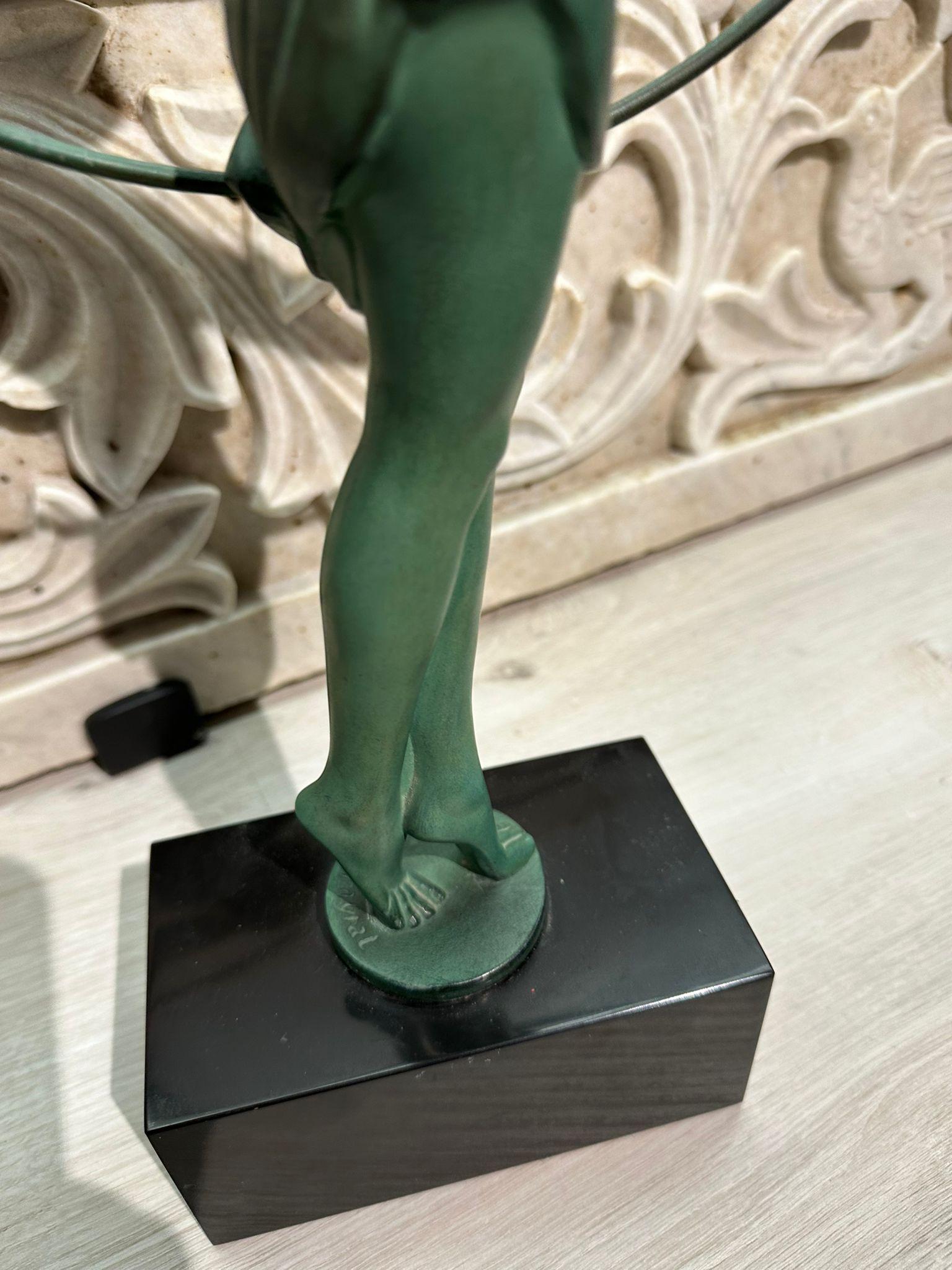 Pierre Le Faguays (1892 – 1962) “Dancer with Hoop” Art Deco Bronze Sculpture c.1930

Pierre LE FAGUAYS (1892-1962) dit FAYRAL, - Danseuse au cerceau, - 
Antique green patina regule subject on a black marble base. 
Signed on the regule base
Height :