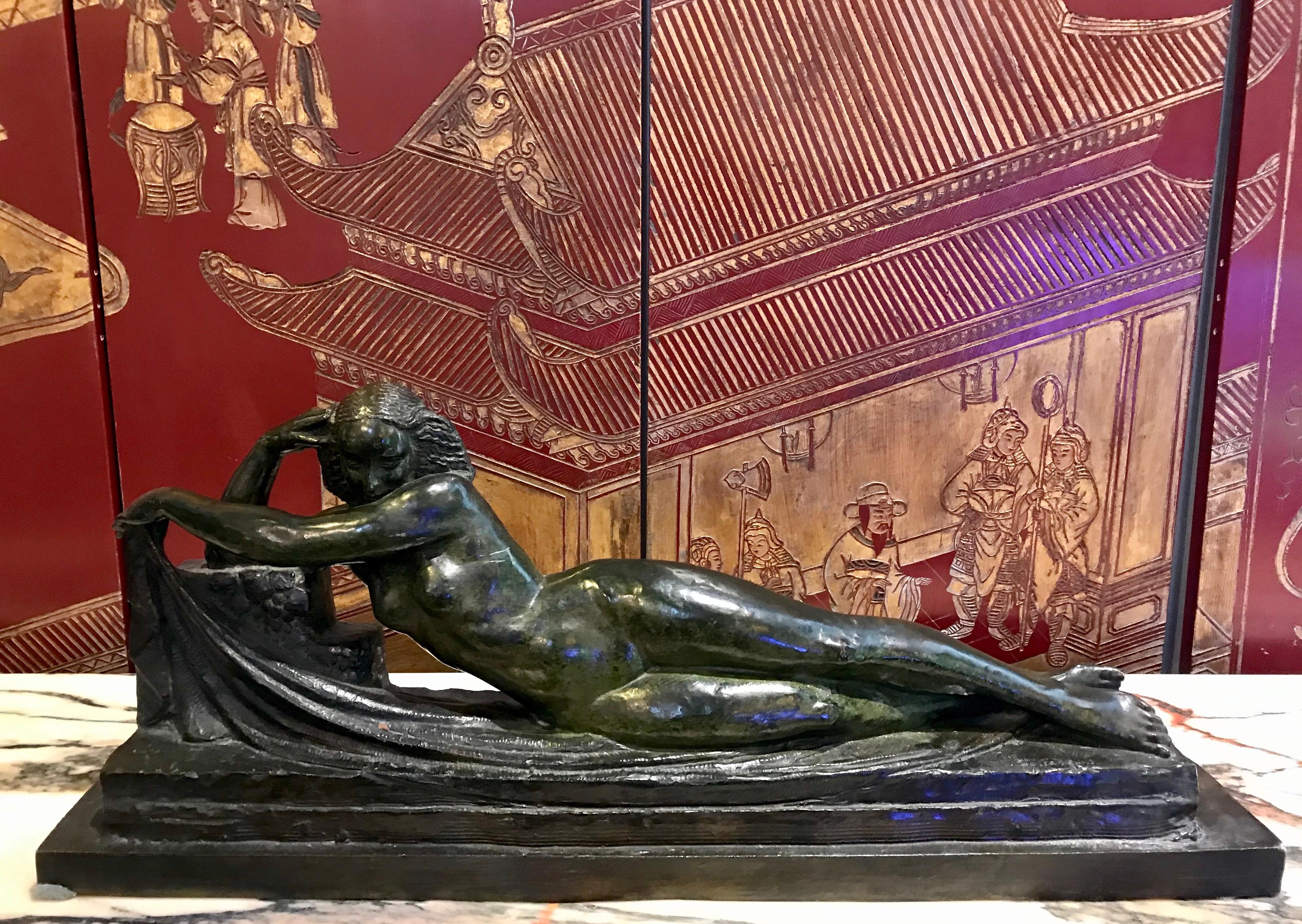 Pierre Le Faguays, French sculptor female figure in green patinated bronze. Modeled as a female nude with draped cloth. Tremendous details, unusual texture portrayed in a form rarely seen in his Art Deco sculptures. Signed Le Faguays on the base