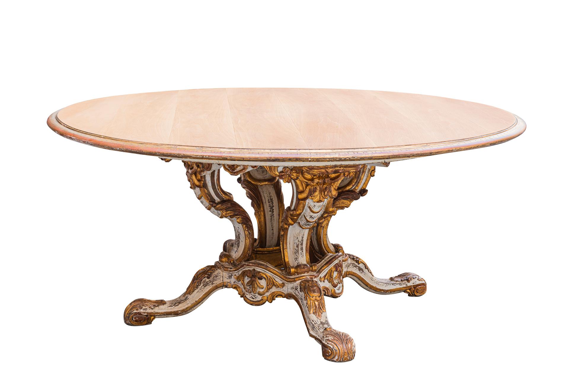 Pierre Lottier, important gueridon in the style of Rococo,
Sculpted and gilt wood, natural wood tabletop,
Sculpted feet and struts decorated with foliage and 