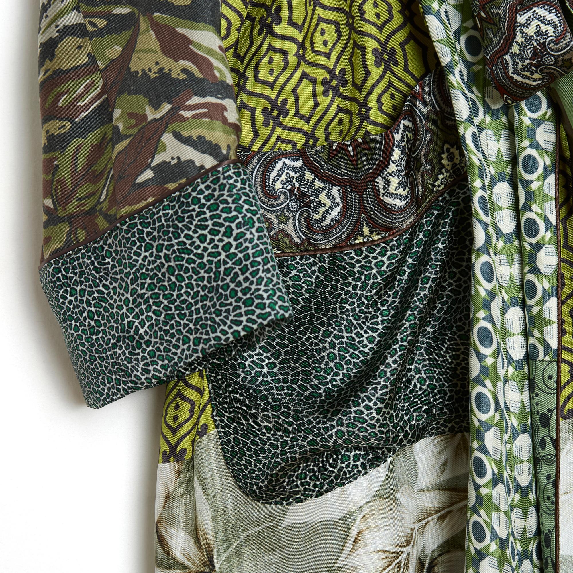 Pierre Louis Mascia long kimono in silk twill patchwork in different patterns and tones of green, shawl collar, 2 patch pockets on the hips, removable belt to tie in the front. One size (perfect from 36 to 42). The kimono is in excellent condition,