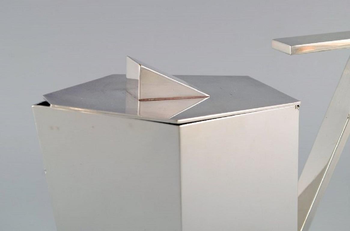 Pierre Meurgey, Paris. Two cubist pots in plated silver. Mid 20th C. 2