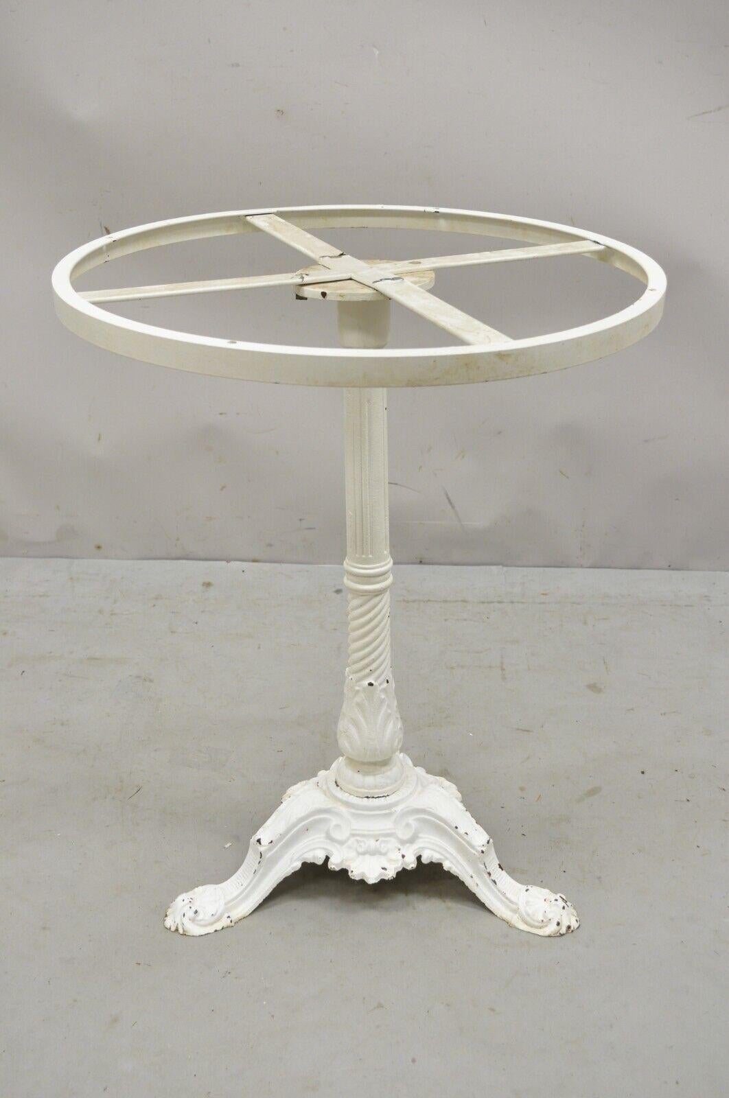 Pierre Ouvrier & E Ringuet Paris French cast iron bistro pedestal table base. Item features a heavy cast iron base, original French makers stamp, very nice antique item, quality French craftsmanship, great style and form. Circa early