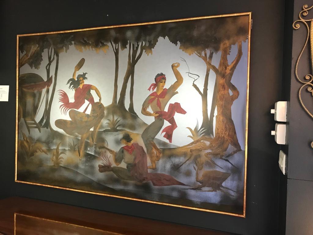 An enchanting large eglomised wall mirror with beautifully painted gypsy dancers in a mystical forest by the French artist Pierre Pansard. It has a gold painted frame.