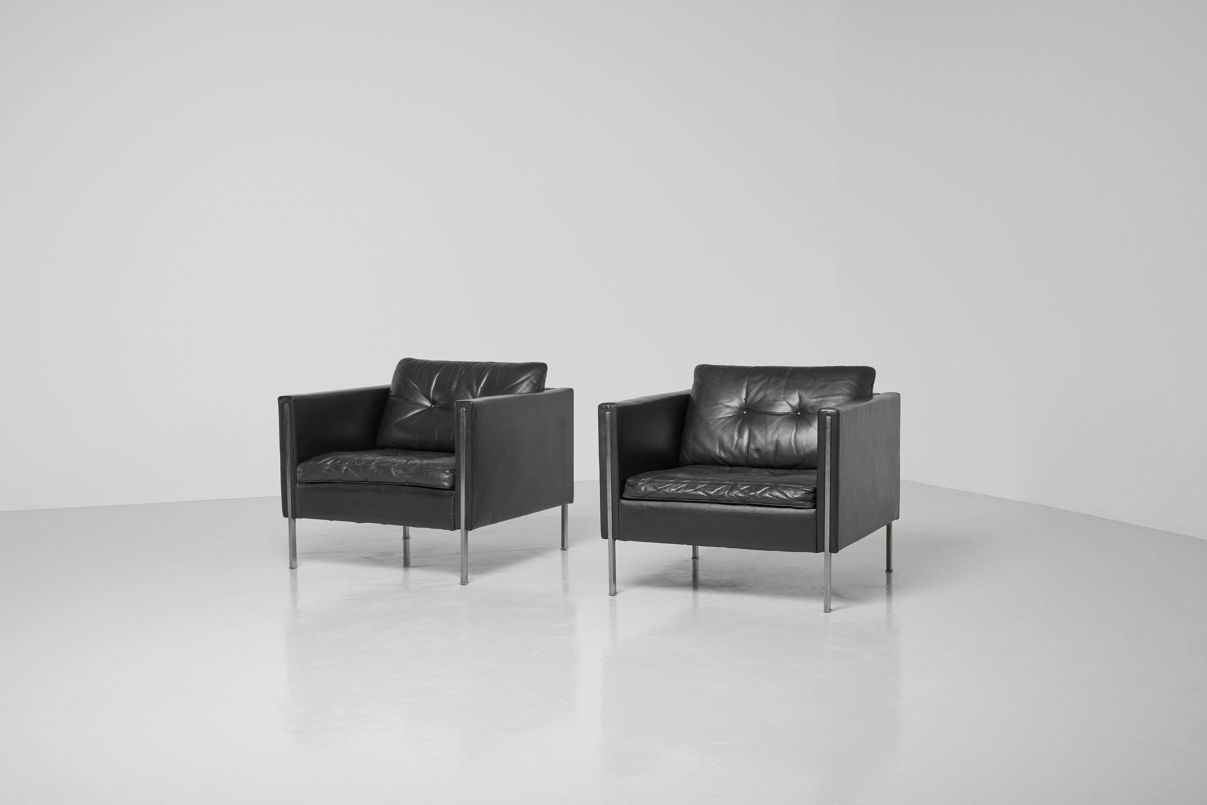 Nice minimalistic pair of model 442 lounge chairs designed by Pierre Paulin and manufactured by Artifort, The Netherlands 1962. This is for a pair of lounge chairs model 442 which is a set of chairs in quality black leather and matt chrome plated
