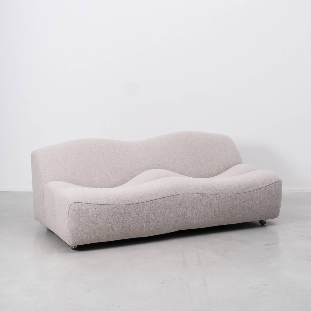 The ABCD sofa by Pierre Paulin is iconic due to its inviting and undulating form. Its design inspiration came from the familiar household object, an egg box. The upholstered waves are made from foam on a fibreglass frame that sits on top of casters.